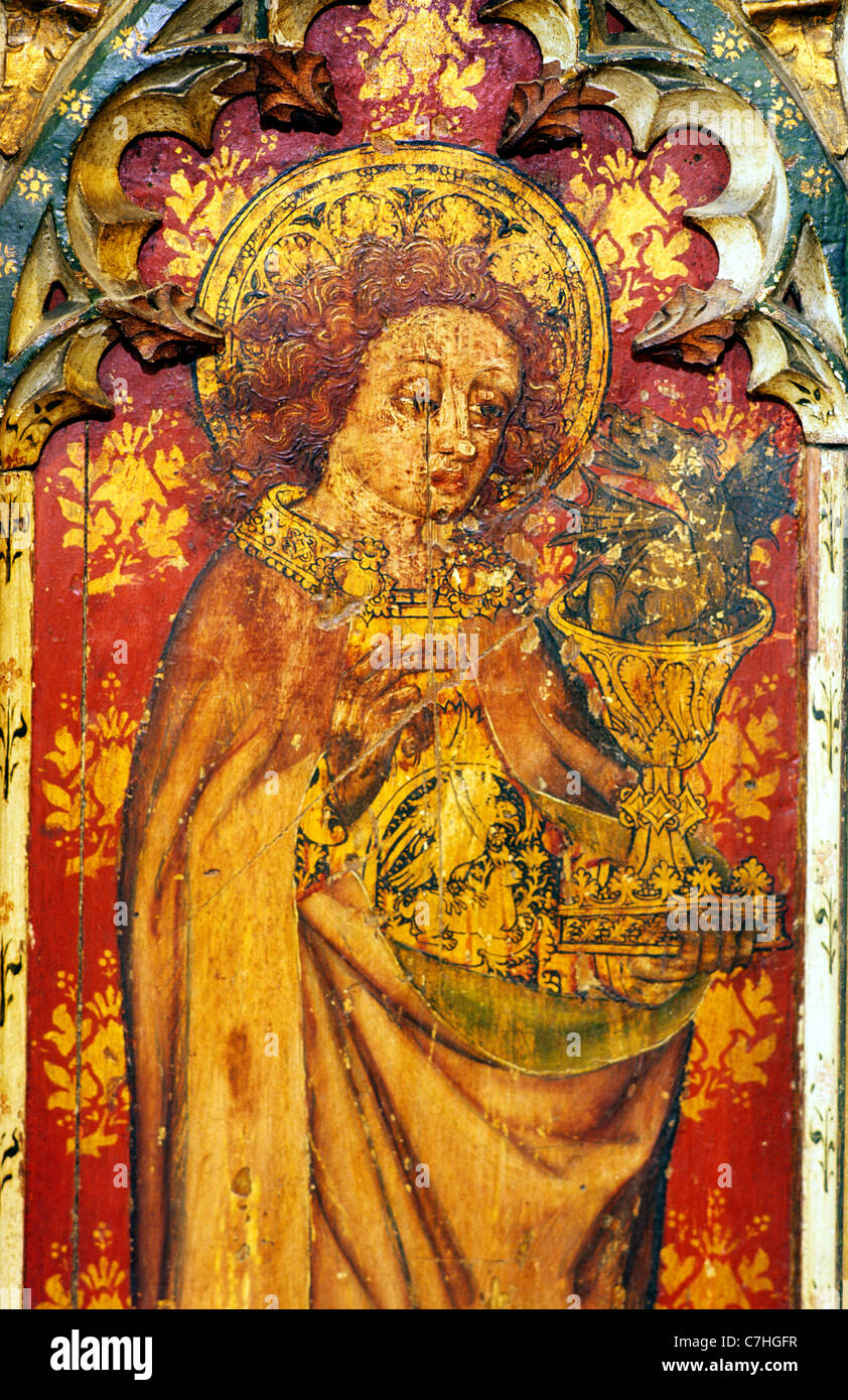 Old Hunstanton, Norfolk, rood screen, St. John holding poisoned chalice, with serpent arising from within, English medieval Stock Photo