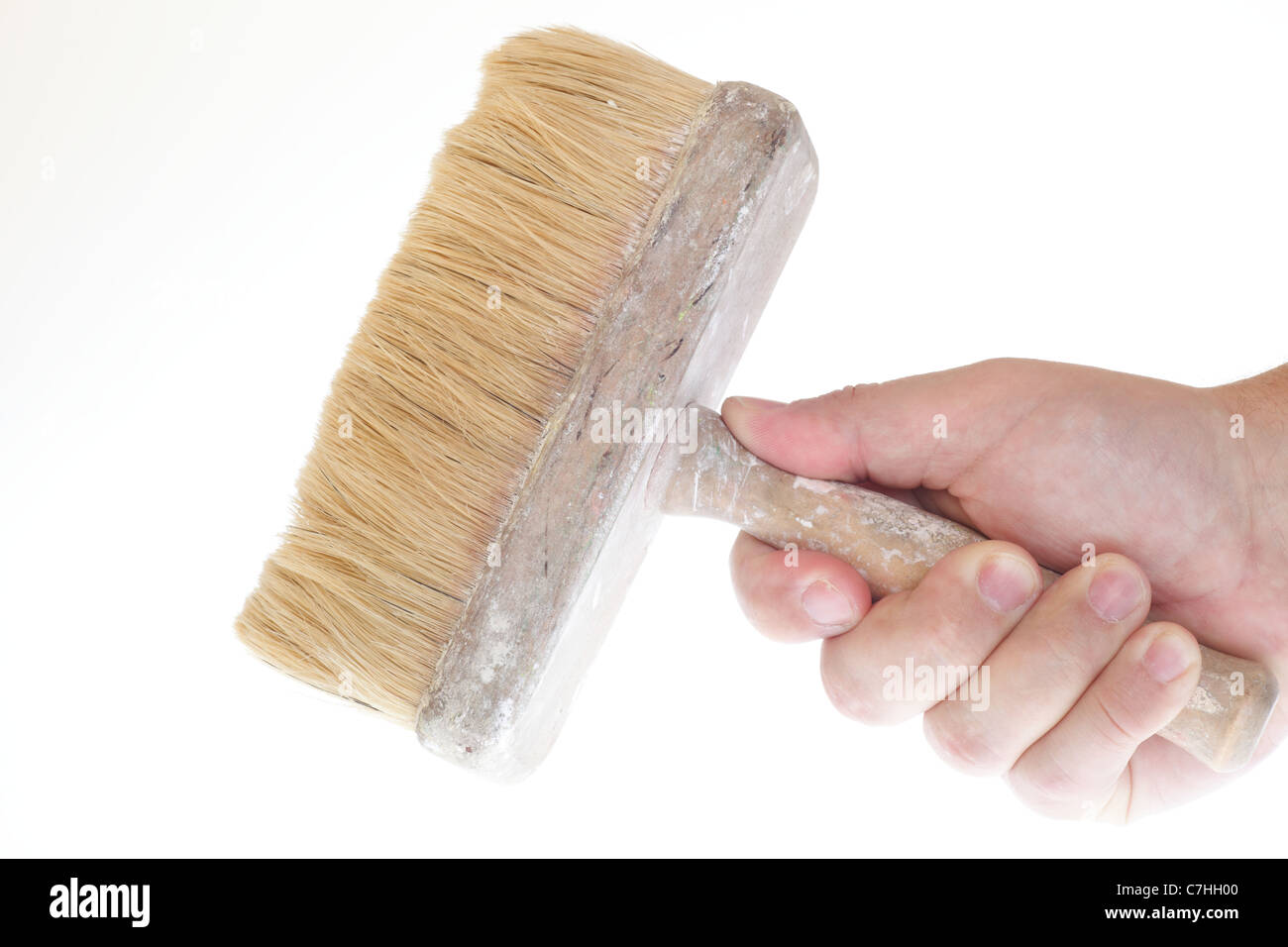 brush isolated in hand on white background Stock Photo - Alamy