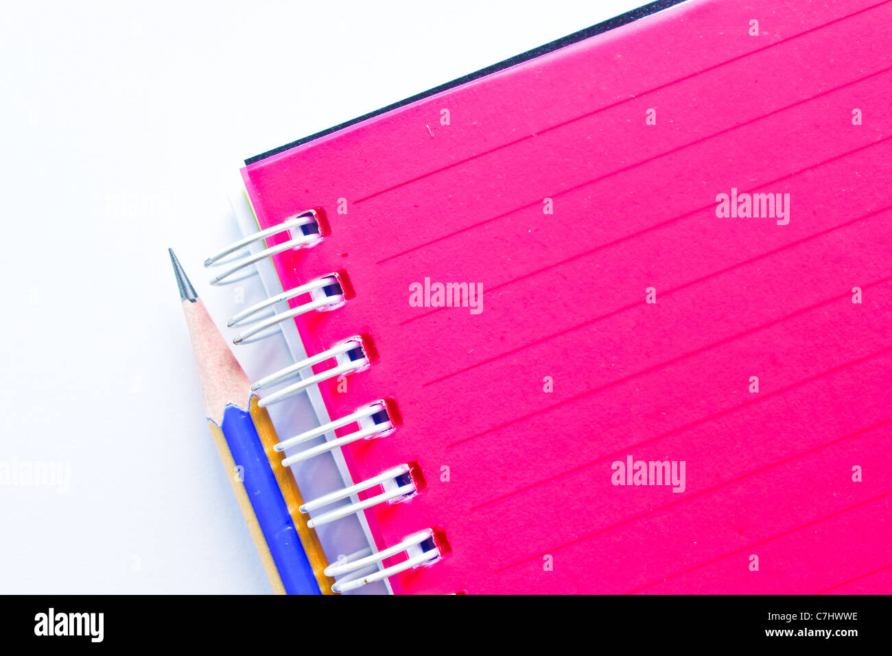 red note book and pencil on white background Stock Photo - Alamy