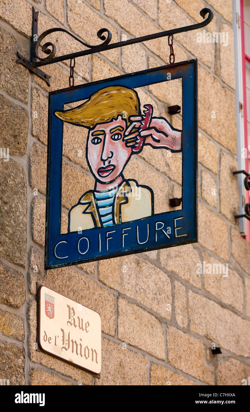 Hairdresser's sign at Moncontour, Brittany, France Stock Photo