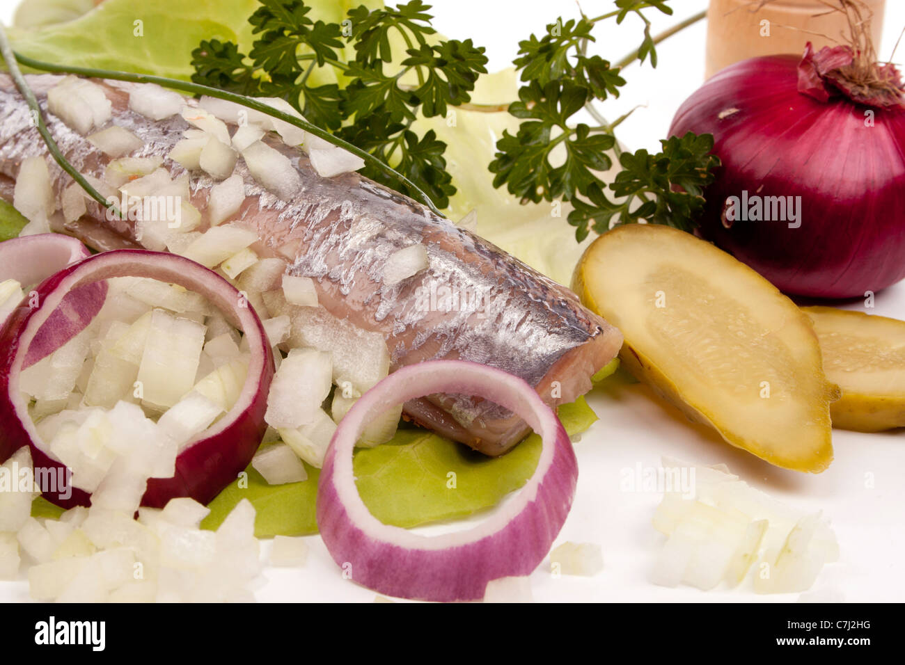 Typical Dutch salted herring called maatje or zoute haring Stock Photo Alamy