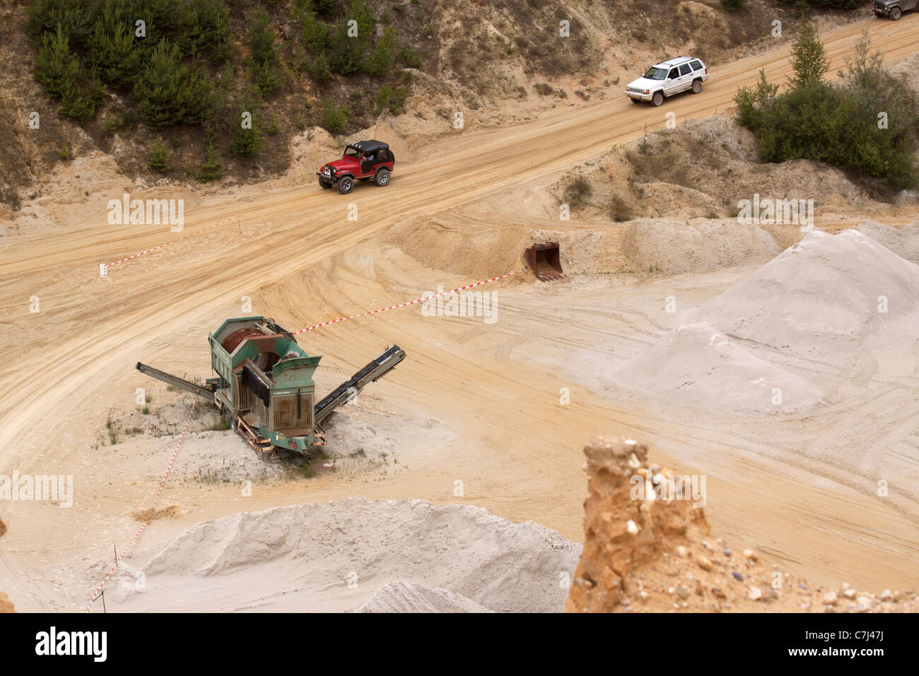 four wheel cars driving in a sand pit Stock Photo - Alamy