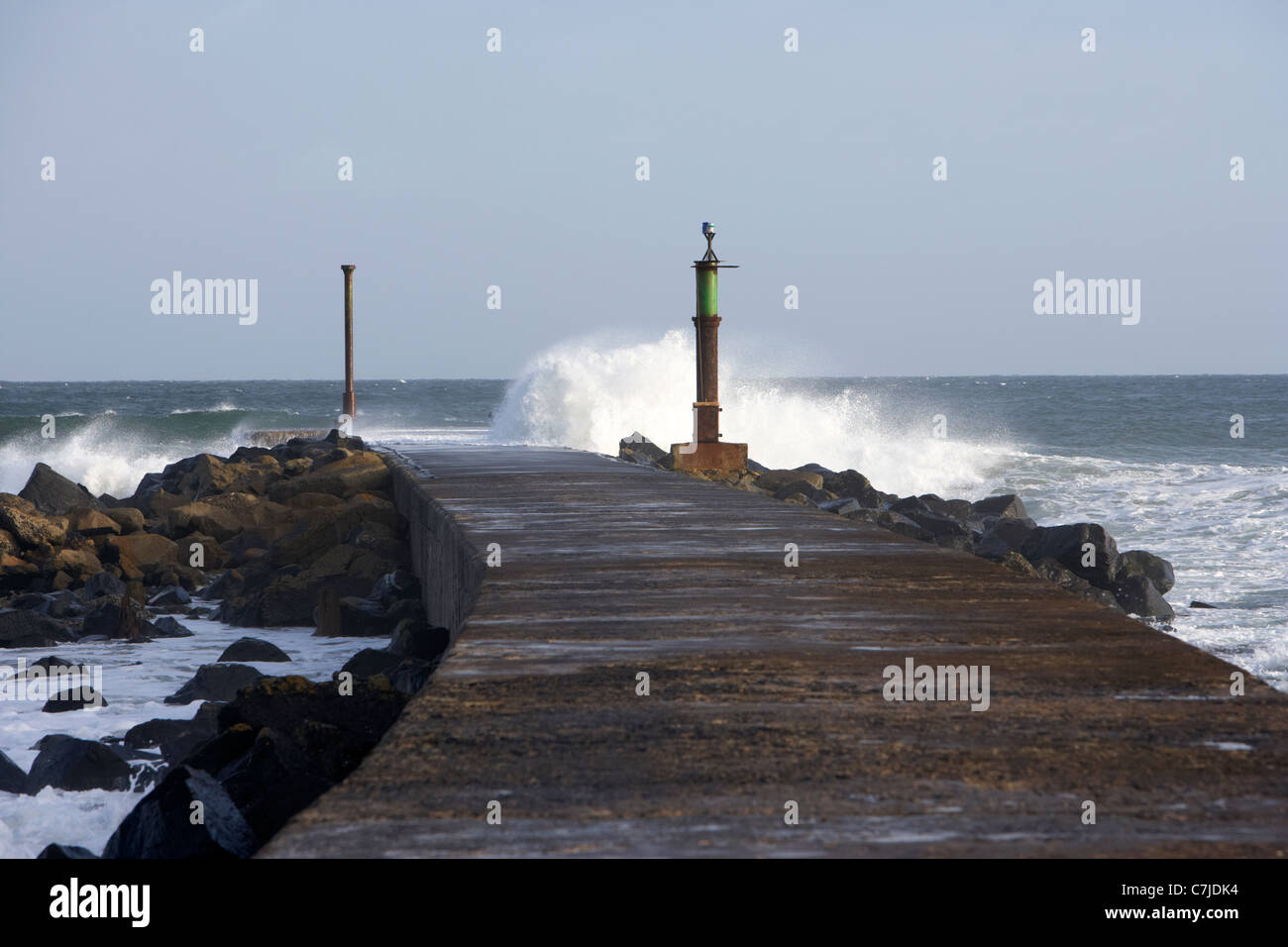waves breaking on pier bann mouth county derry londonderry northern ireland Stock Photo