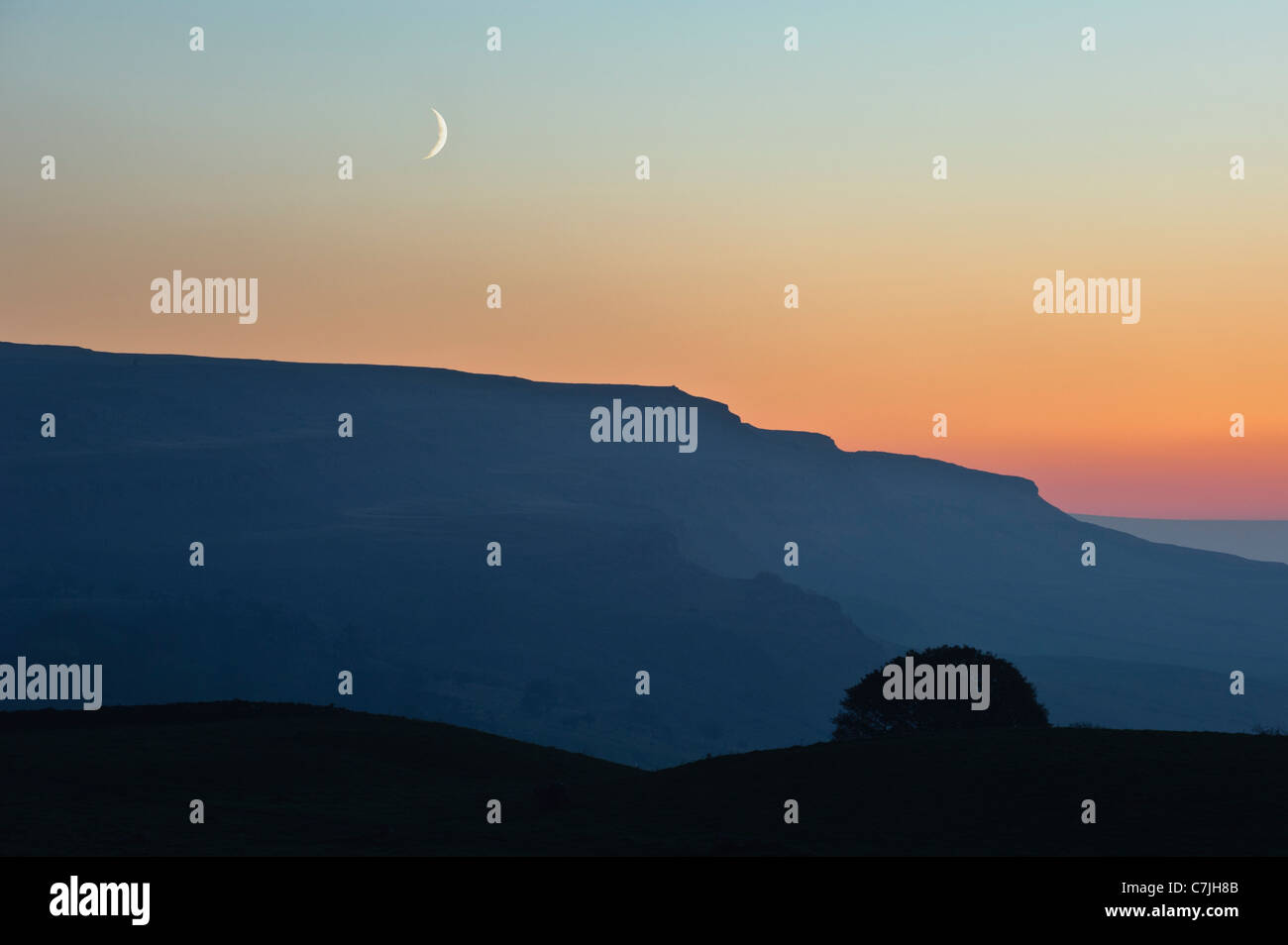 Crescent moon over the Yorkshire Dales, England, UK Stock Photo