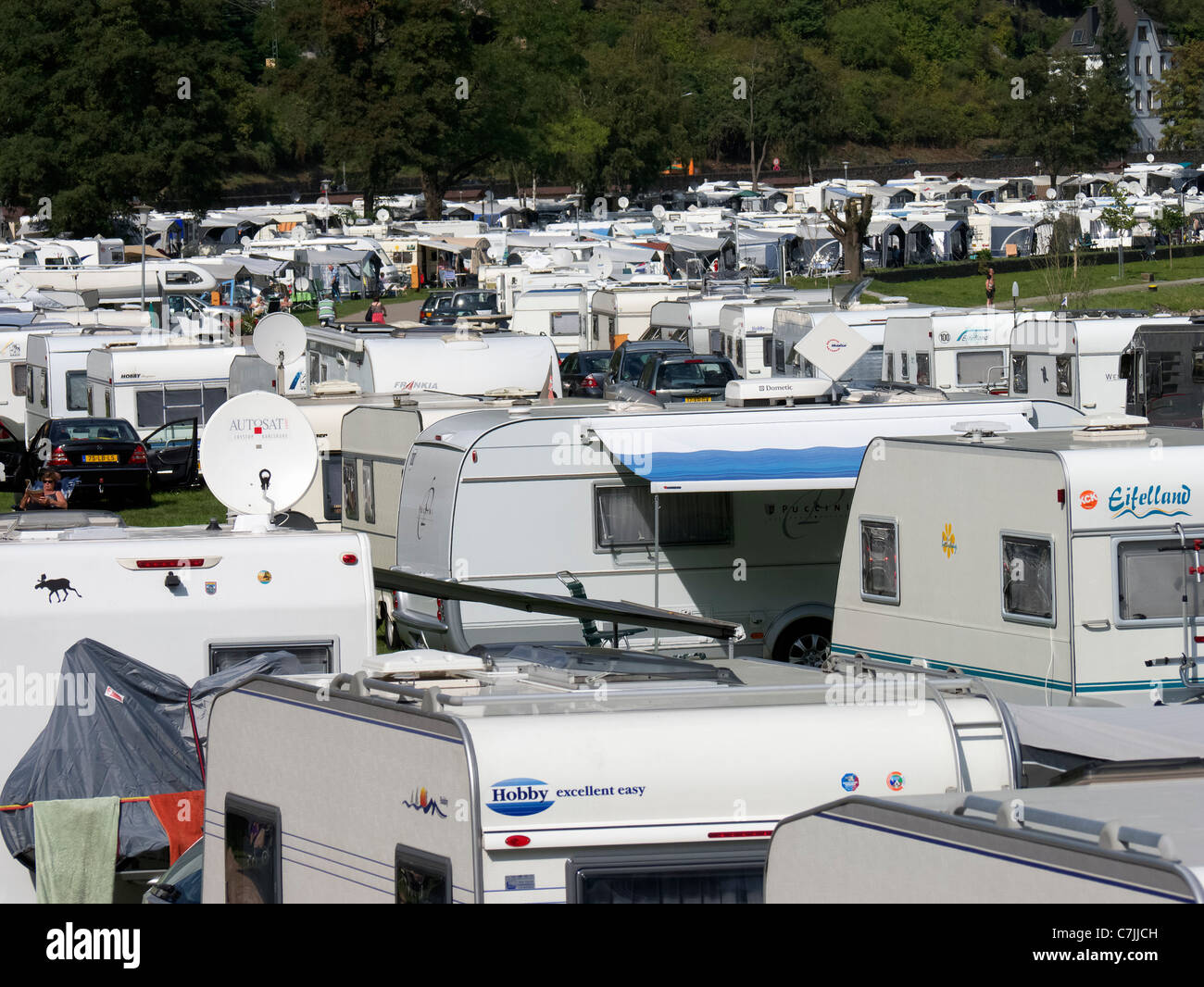Busy caravan park beside River Rhine at the famous Loreley rock near Saint Goar in Germany Stock Photo