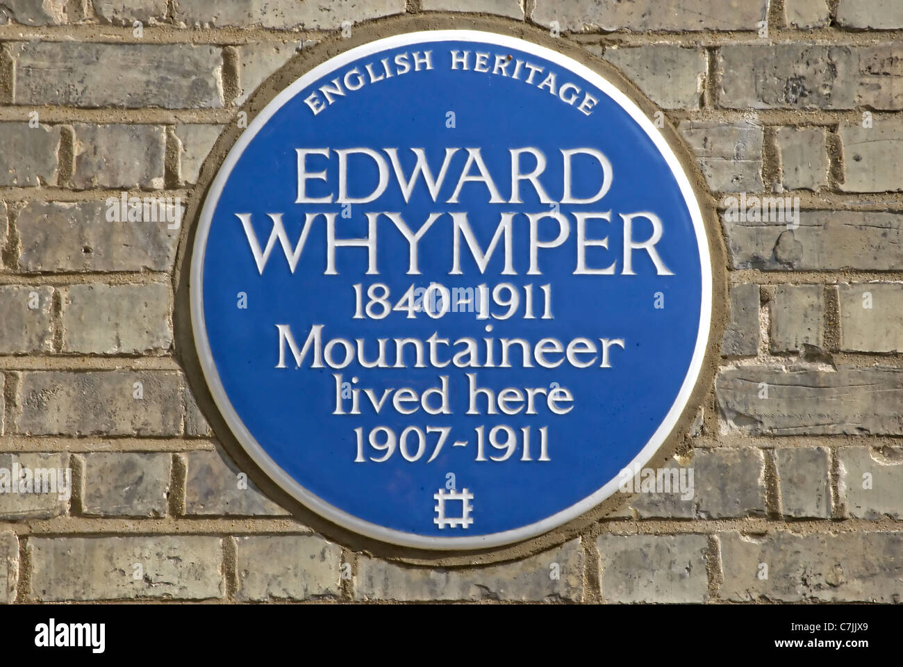 english heritage blue plaque marking a home of mountaineer edward