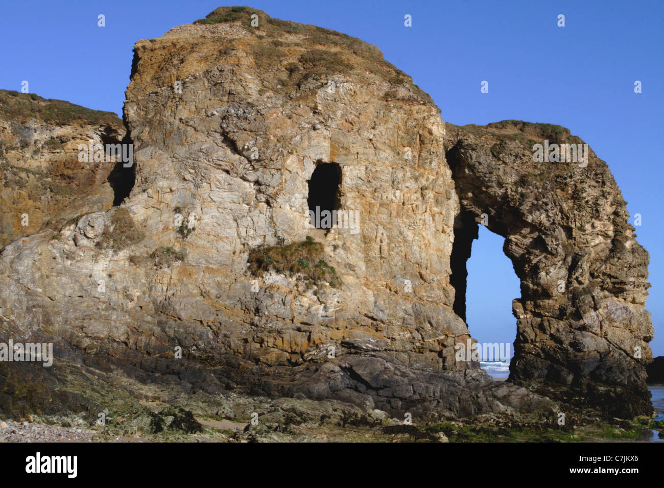 Sea arch and cave rock formation Perranporth Cornwall UK Stock Photo