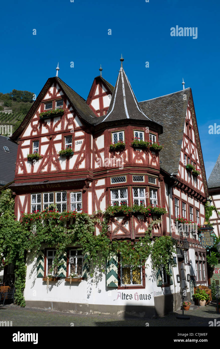 Bacharach; Old Altes Haus half-timbered historic landmark building in  Bacharach Rhineland on River Rhine Germany Stock Photo