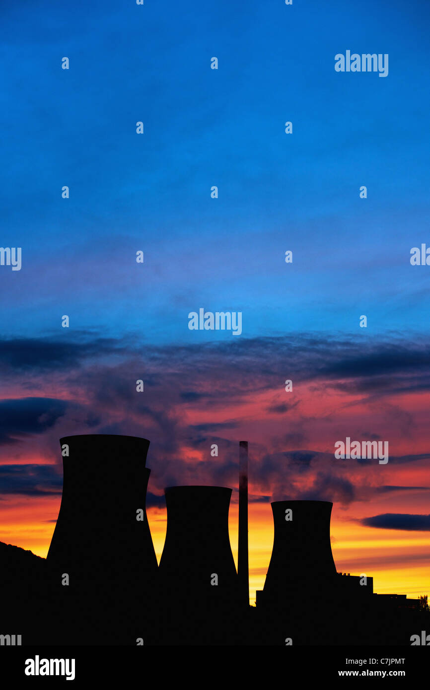 Silhouette of coal plant cooling towers Stock Photo