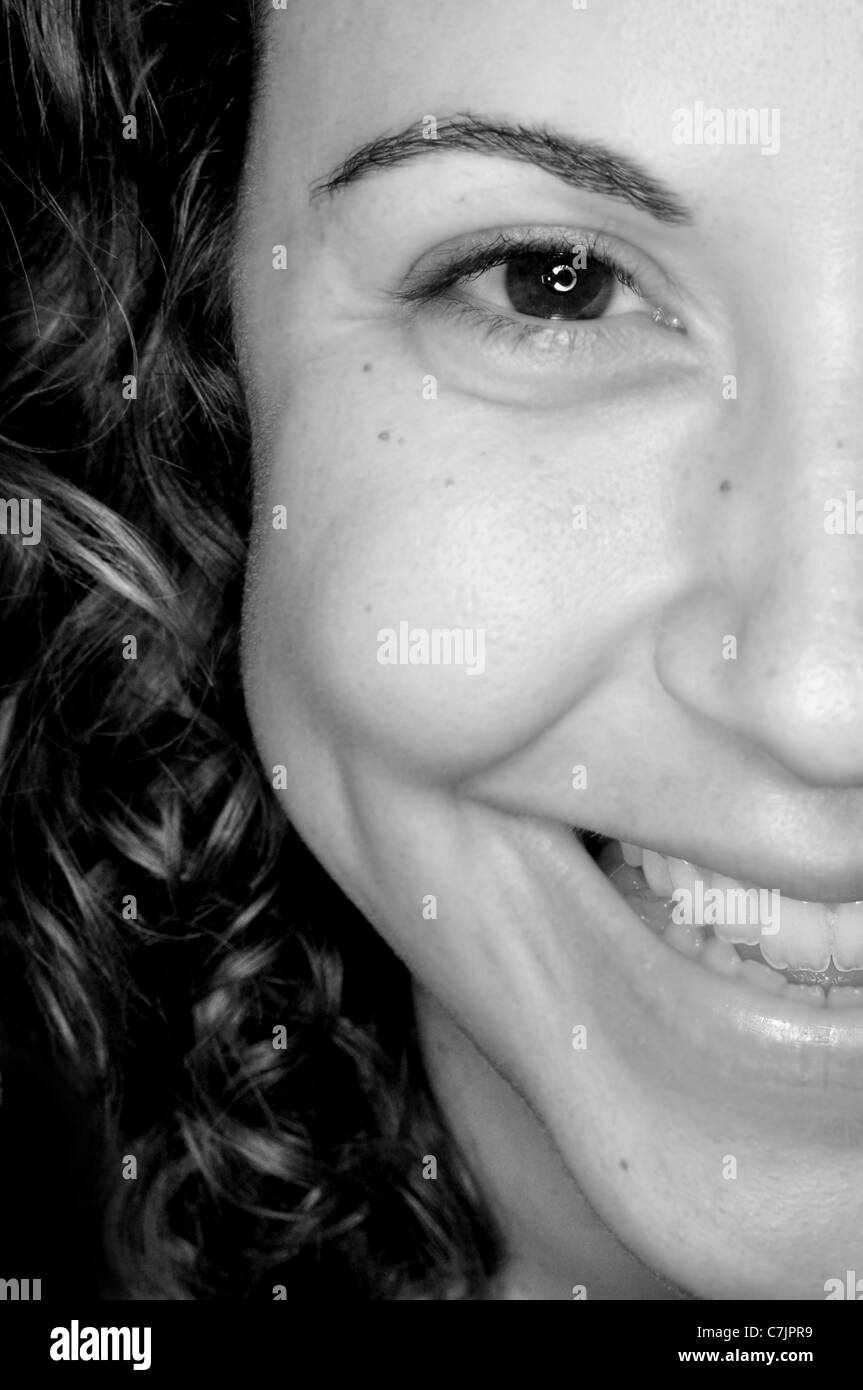 close up portrait of a young woman smiling Stock Photo - Alamy