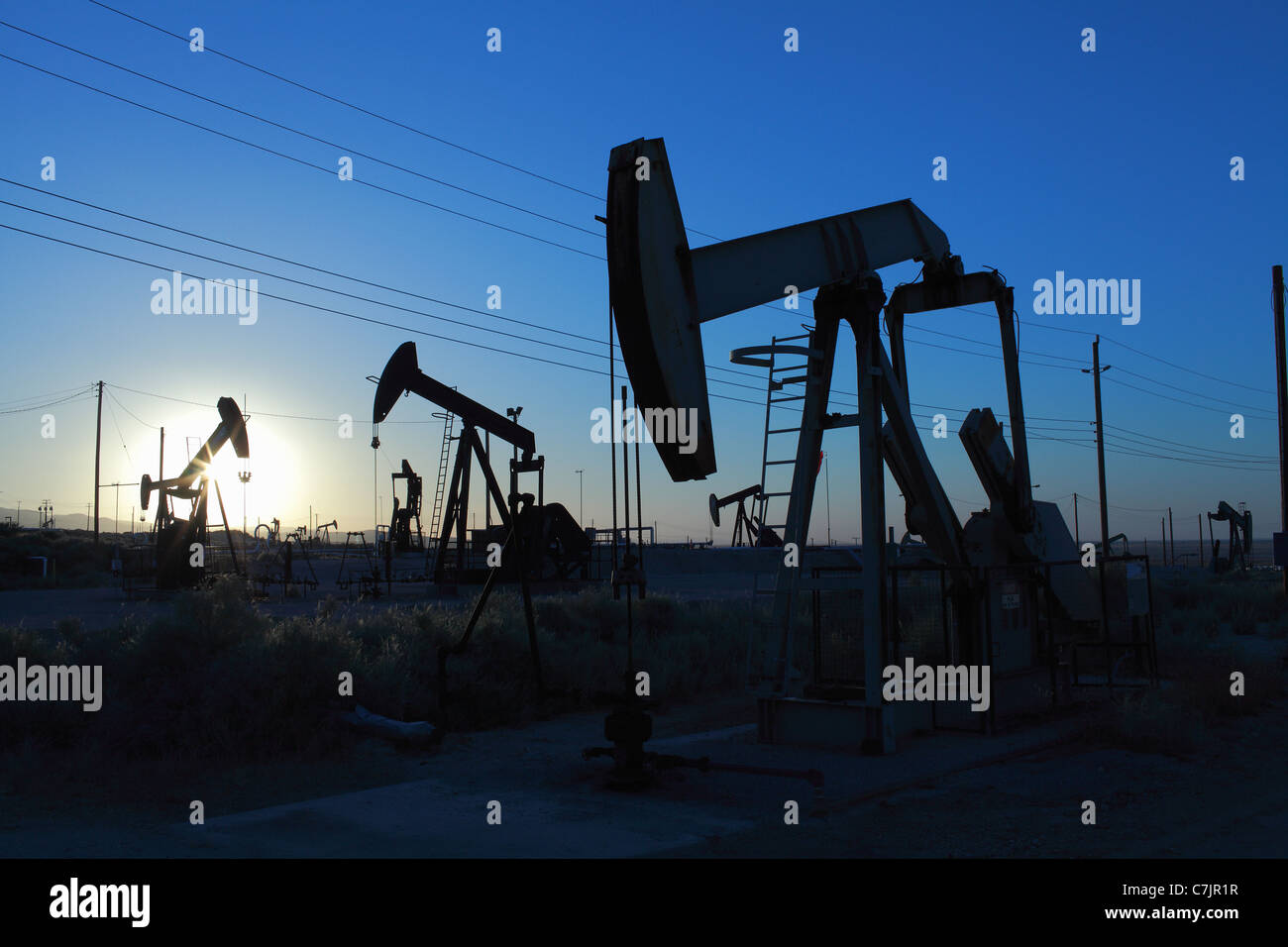 Pumps at oil field Stock Photo Alamy