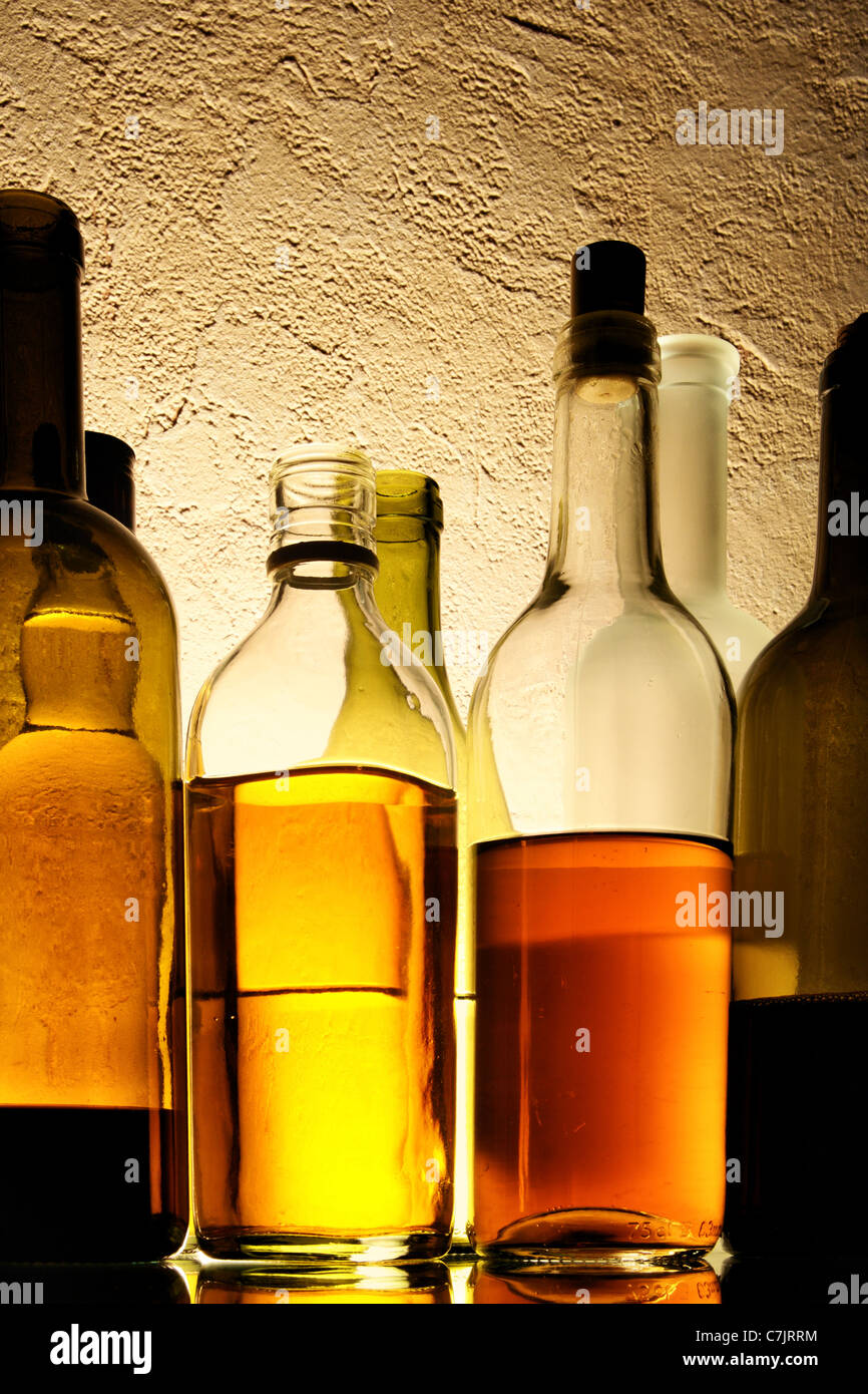 Bottles of alcohol drinks in a row Stock Photo Alamy