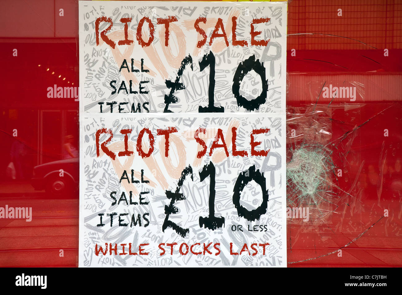 Riot Sale Shattered Glass Window in Manchester, UK Stock Photo - Alamy
