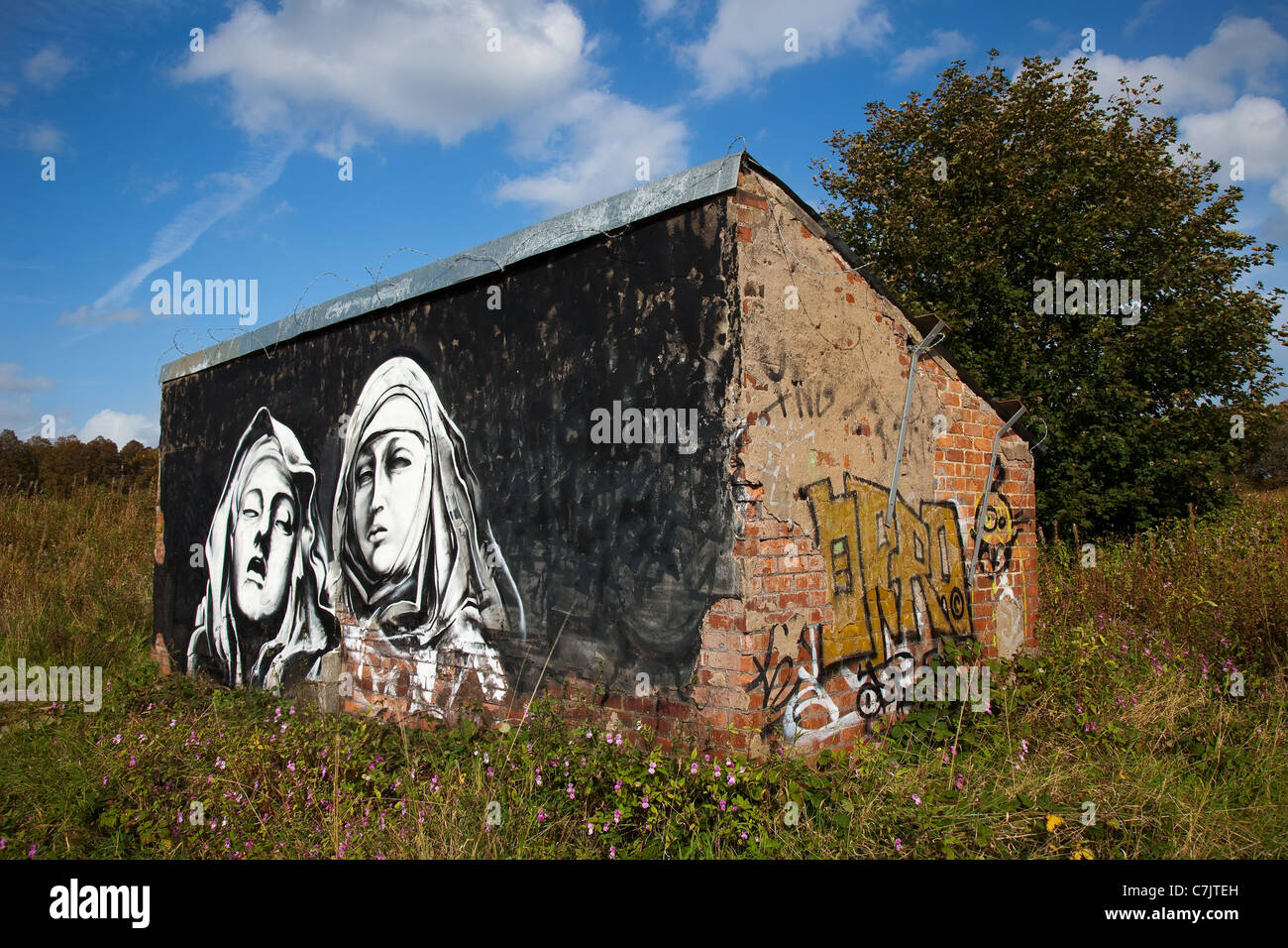 Artwork painting of the ecstasy of St Teresa 17th century Bernini St Teresa of Avila, Graffitied Wall art religious portraits in Preston, UK Stock Photo