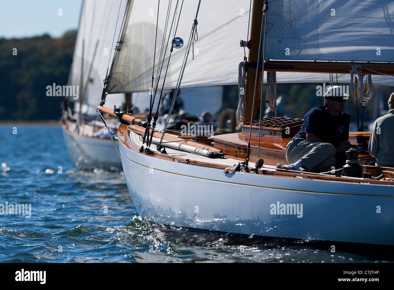 Two classic wooden sailing yachts racing in light wind on Oyster Bay