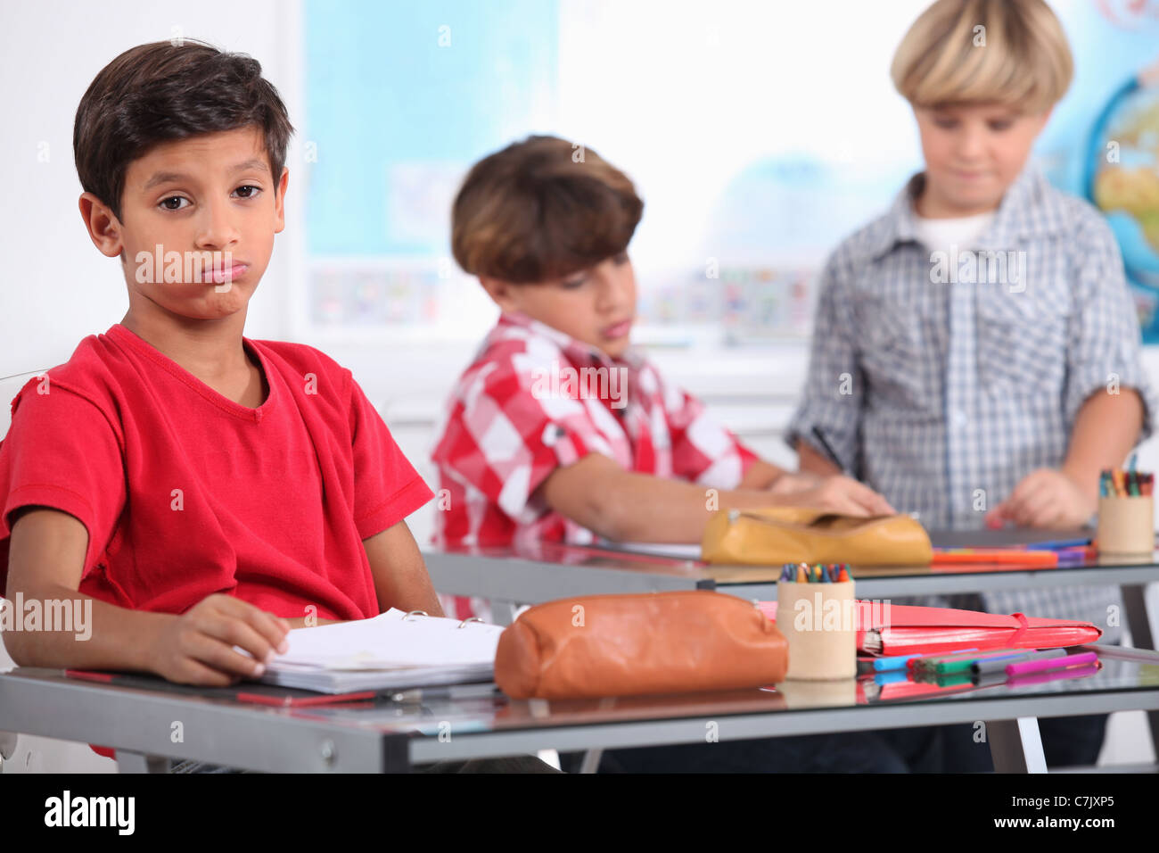 little boy sighing in a classroom Stock Photo - Alamy