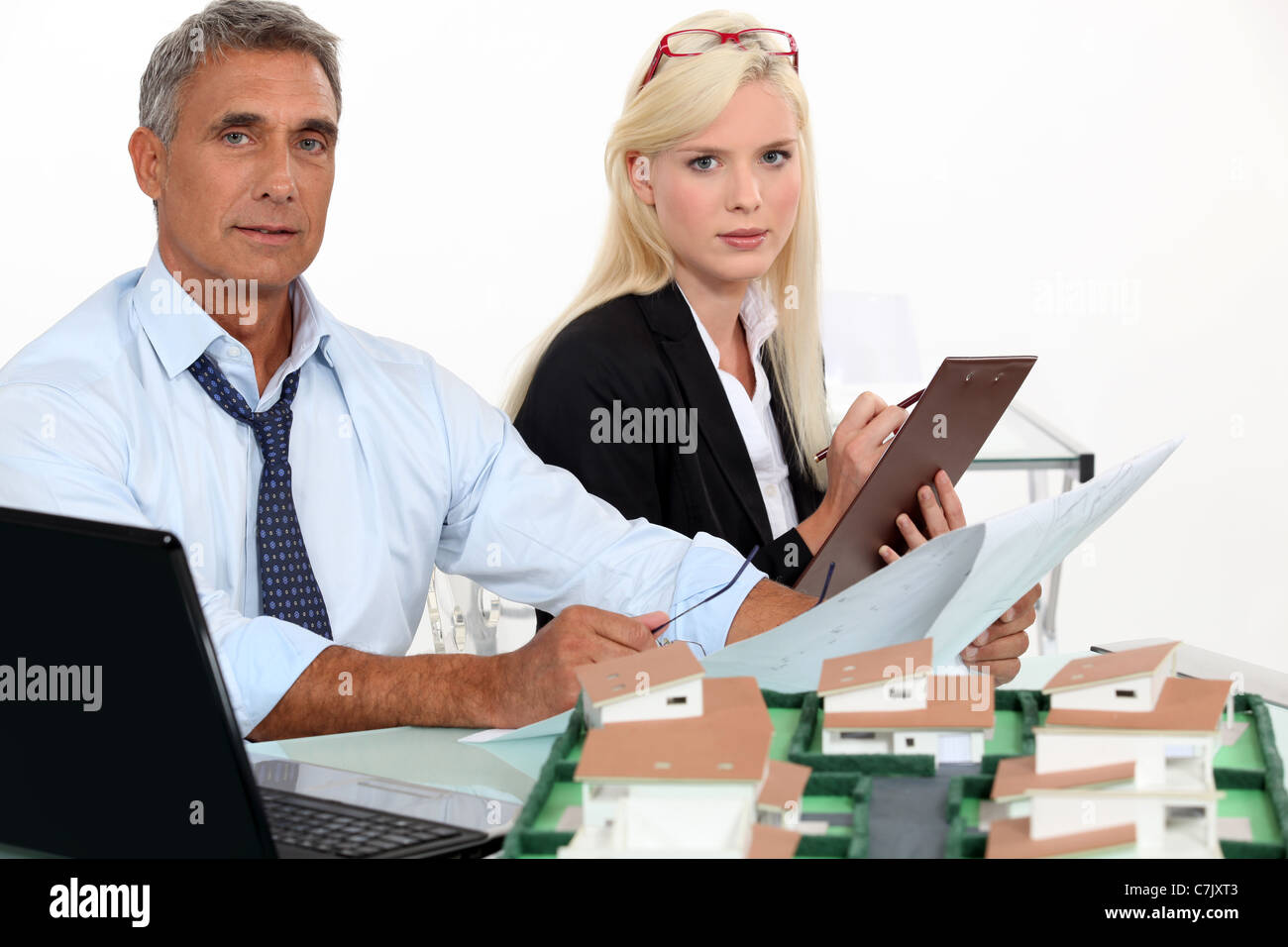 Man and woman at work Stock Photo - Alamy