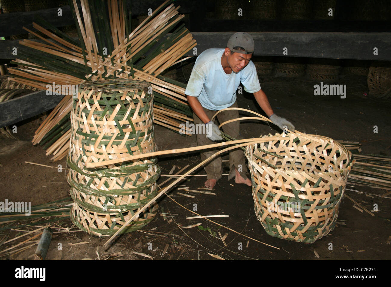 Weaving basket men hi-res stock photography and images - Alamy