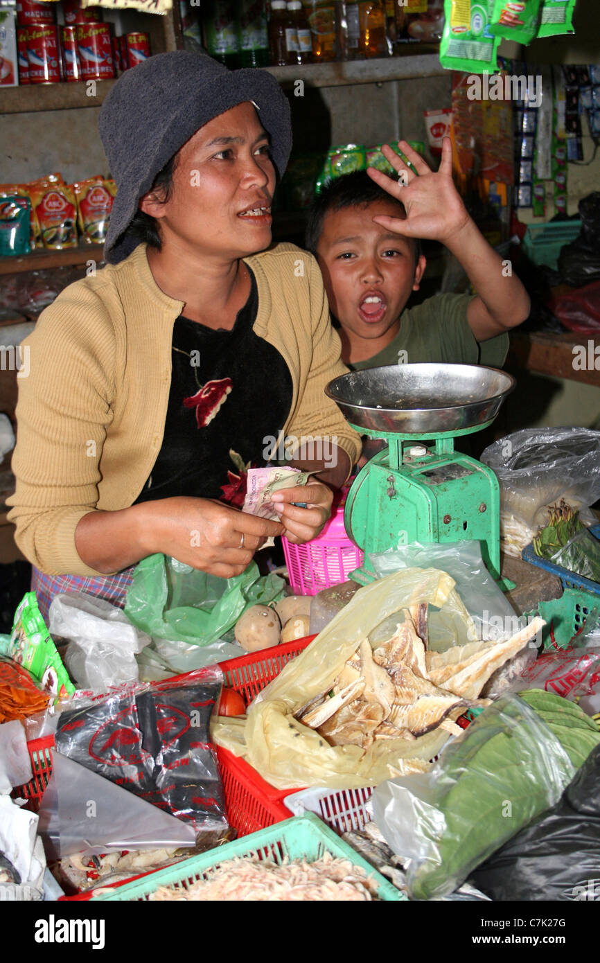 Store-holder And Son in a Karo Batak Village Shop, Sumatra Stock Photo