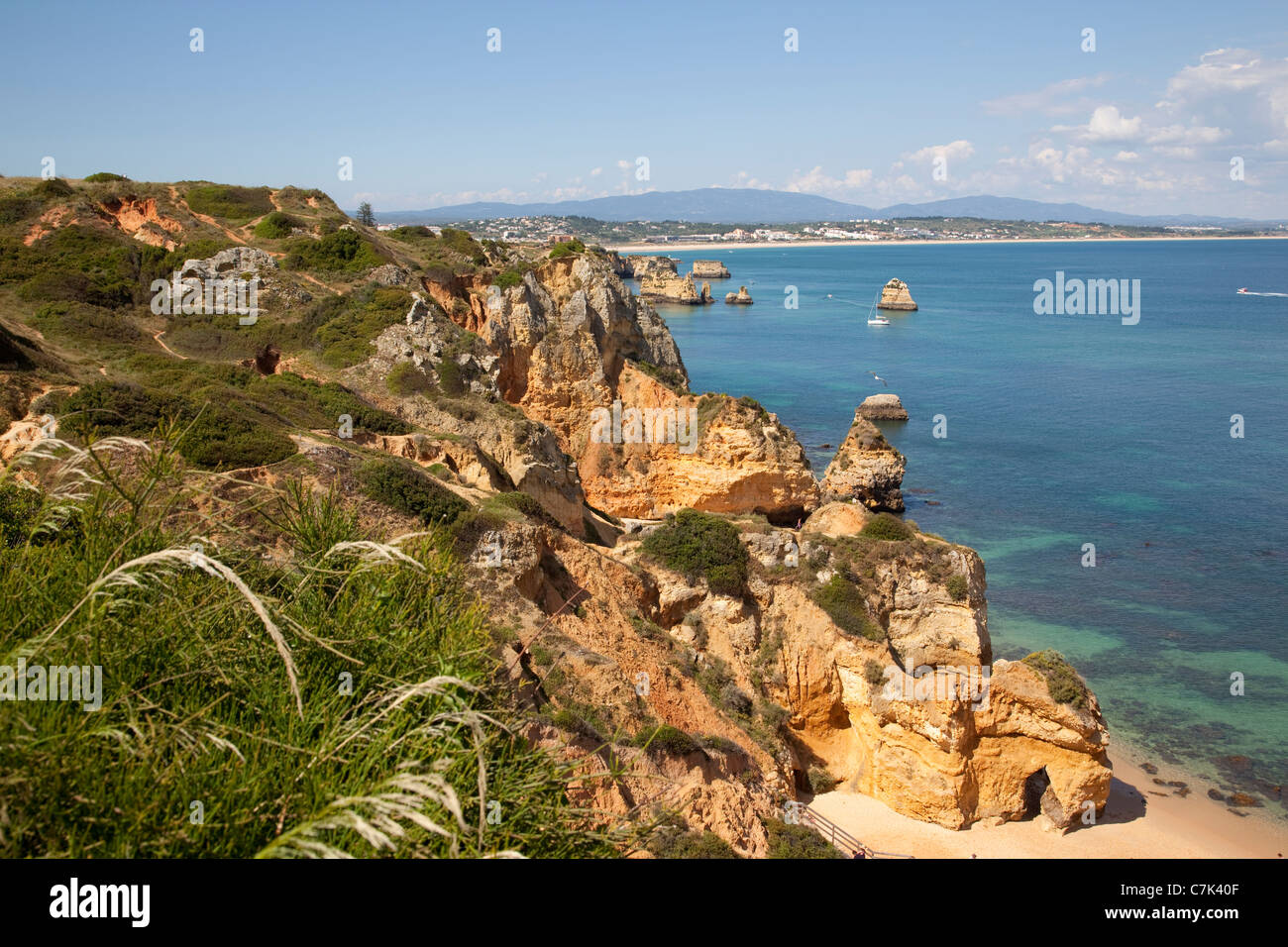 Portugal, Algarve, Lagos, Meia Camilo, Beach & Rocky Coastline Stock Photo
