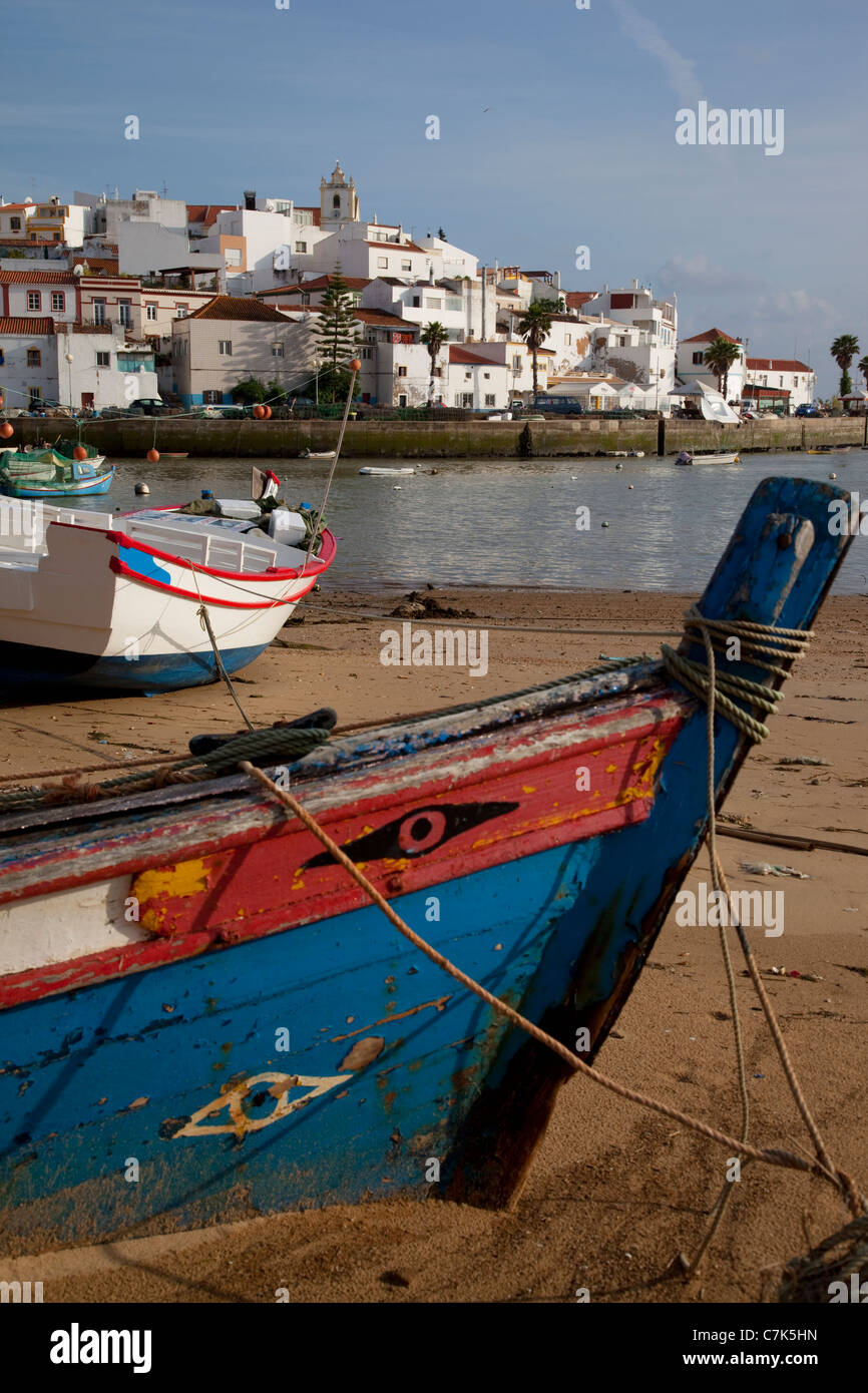 Portugal, Algarve, Ferragudo, Village & Boats on the Beach Stock Photo