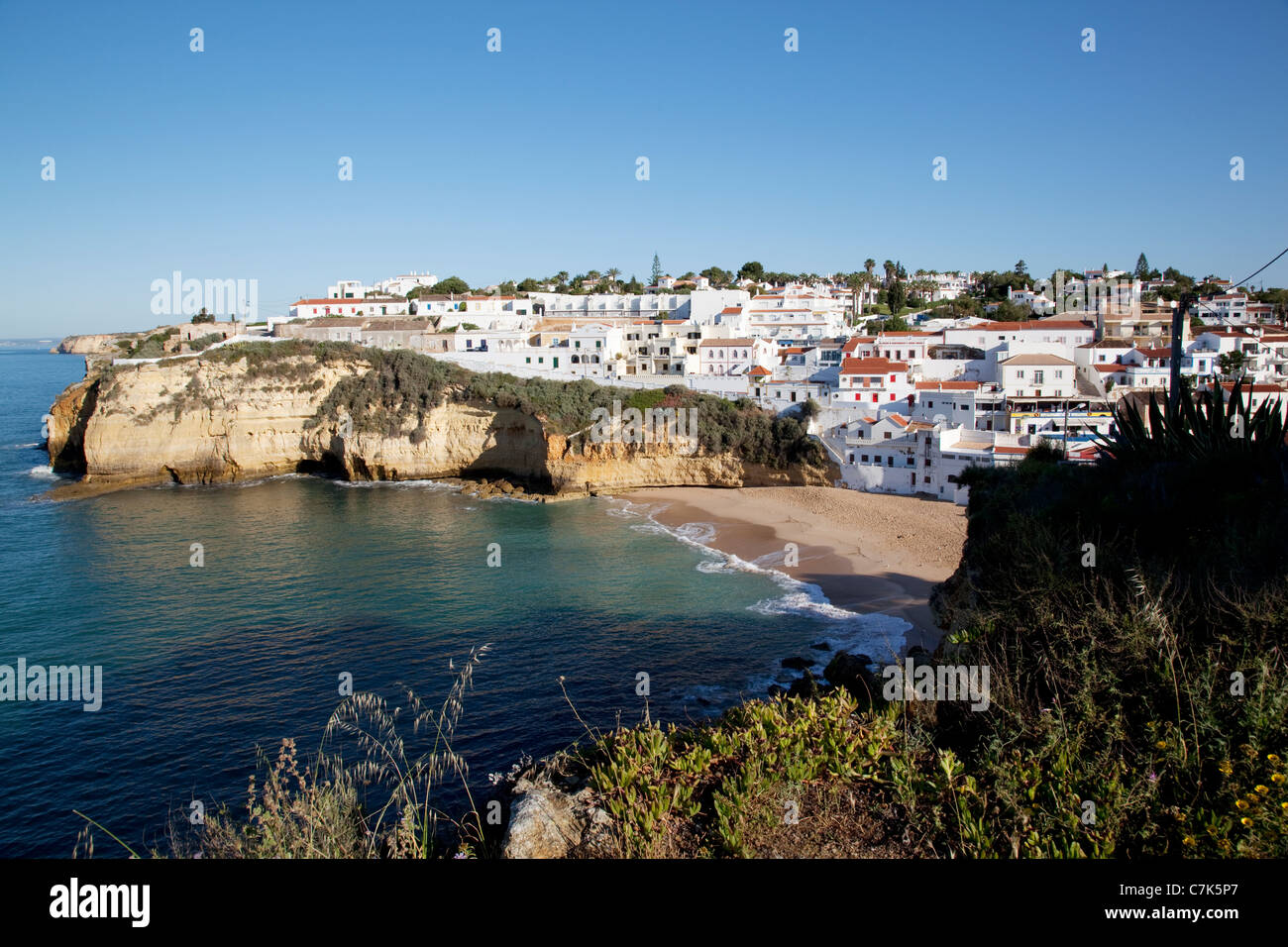 Portugal, Algarve, Carvoeiro, Town & Coastline at Dawn Stock Photo