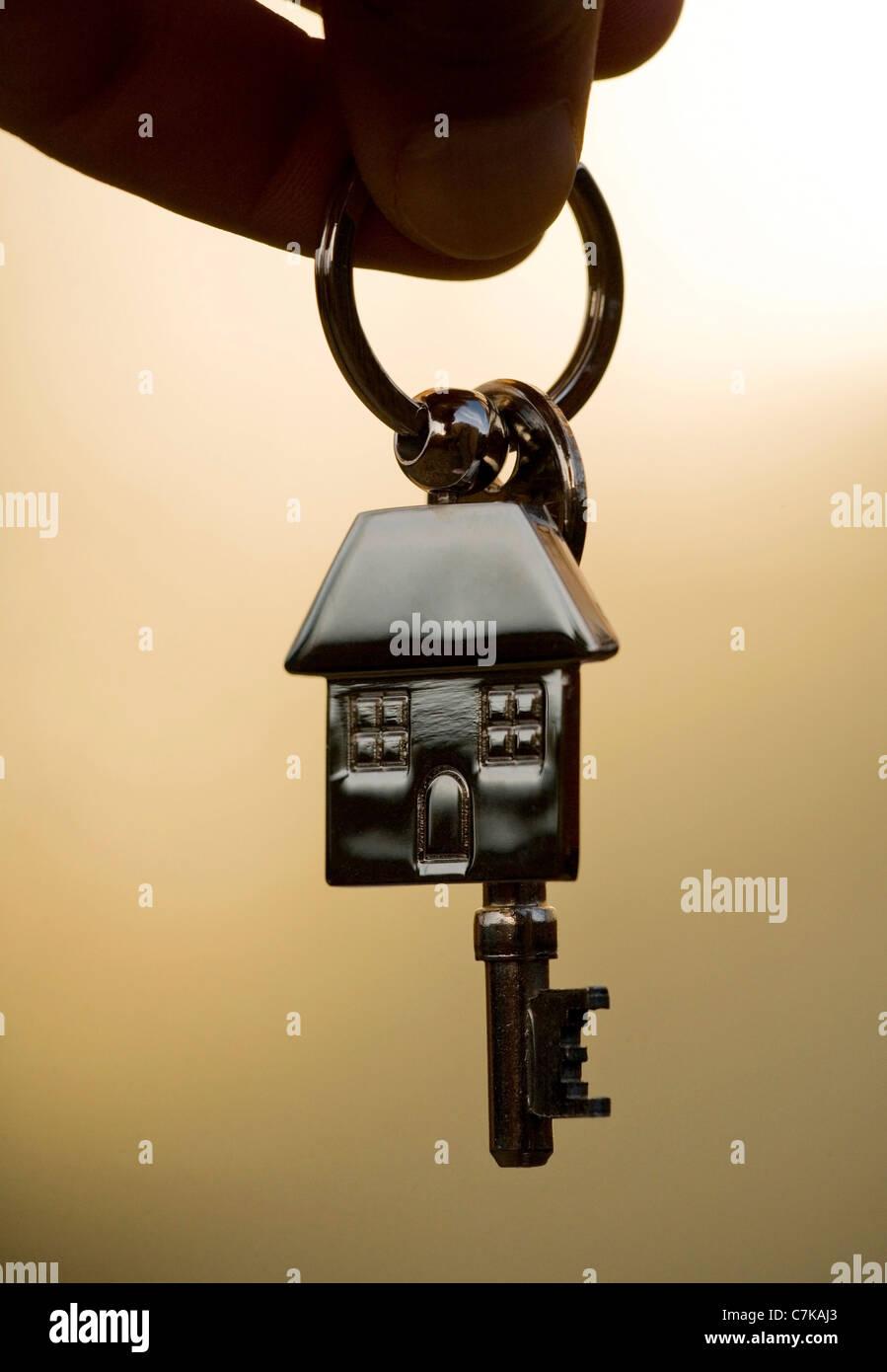 First house keys in silhouette Stock Photo