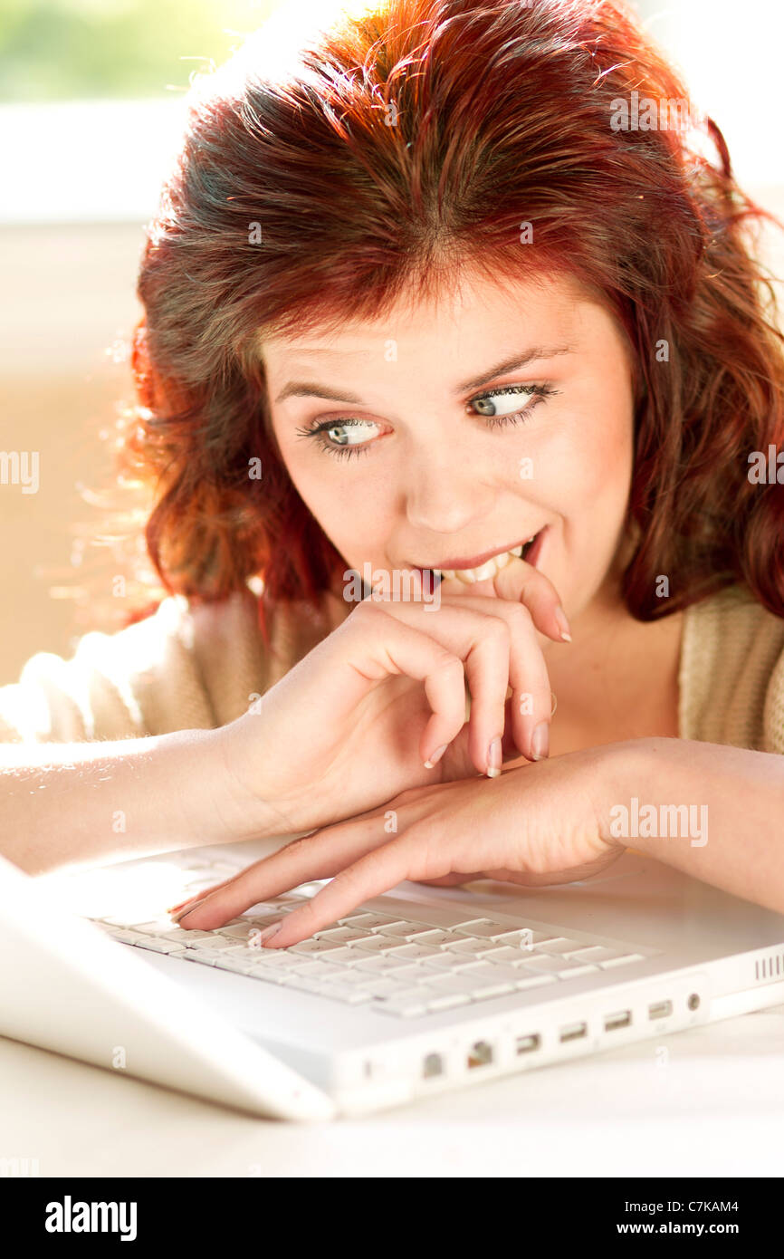 Girl using laptop Stock Photo