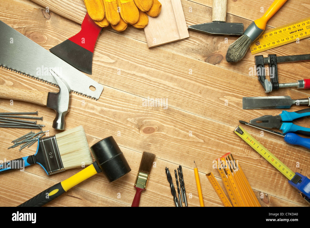 Different tools on a wooden background. Stock Photo