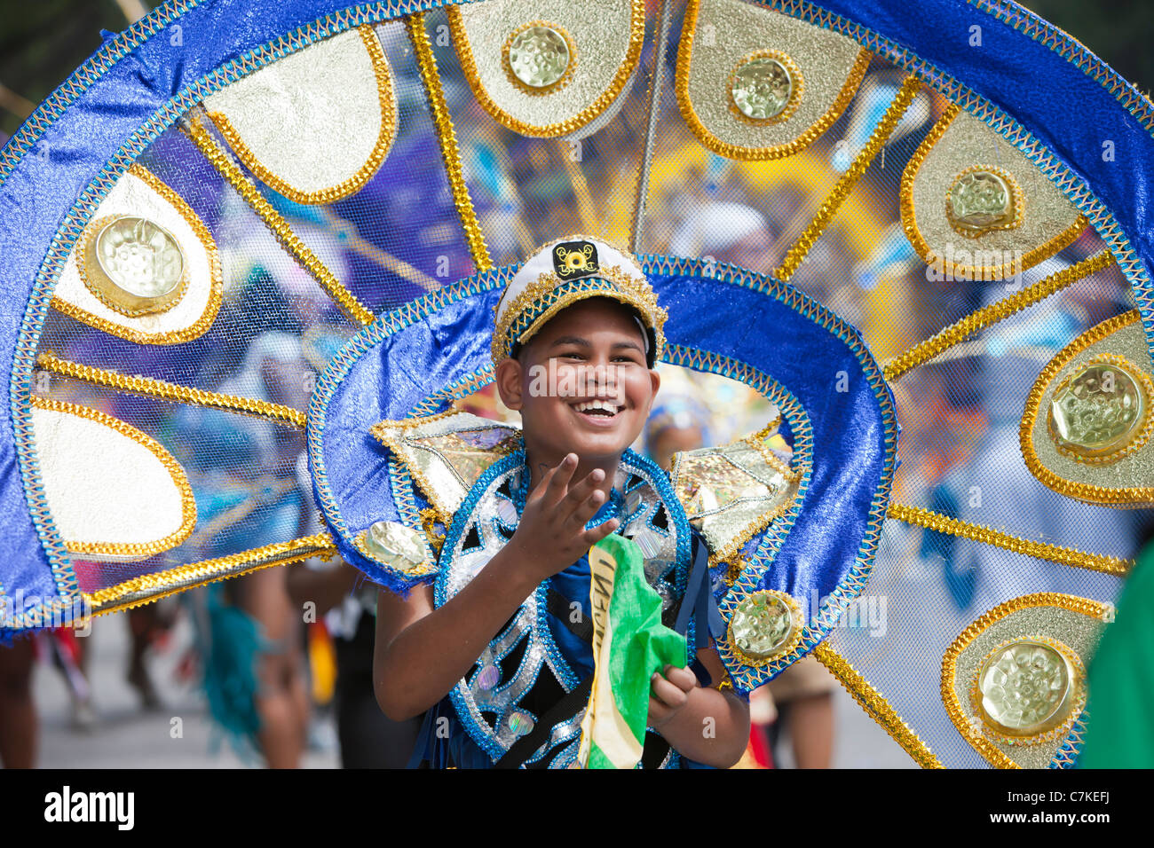 A parade participant in festive attire at the West Indian-American Day Parade in New York City. Stock Photo