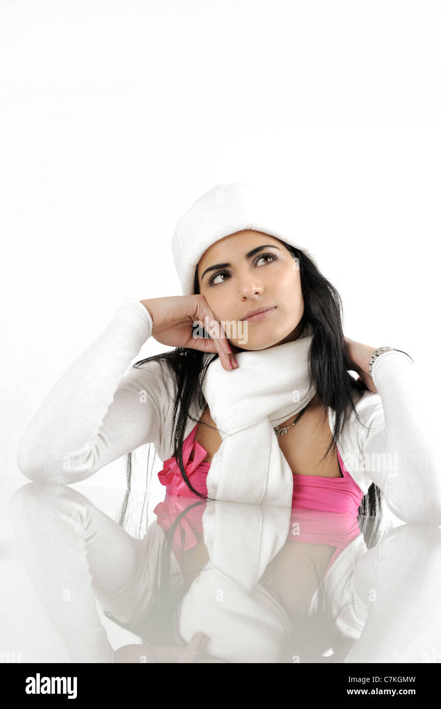 Young, trendy, Indian businesswoman, 23, with scarf and cap Stock Photo