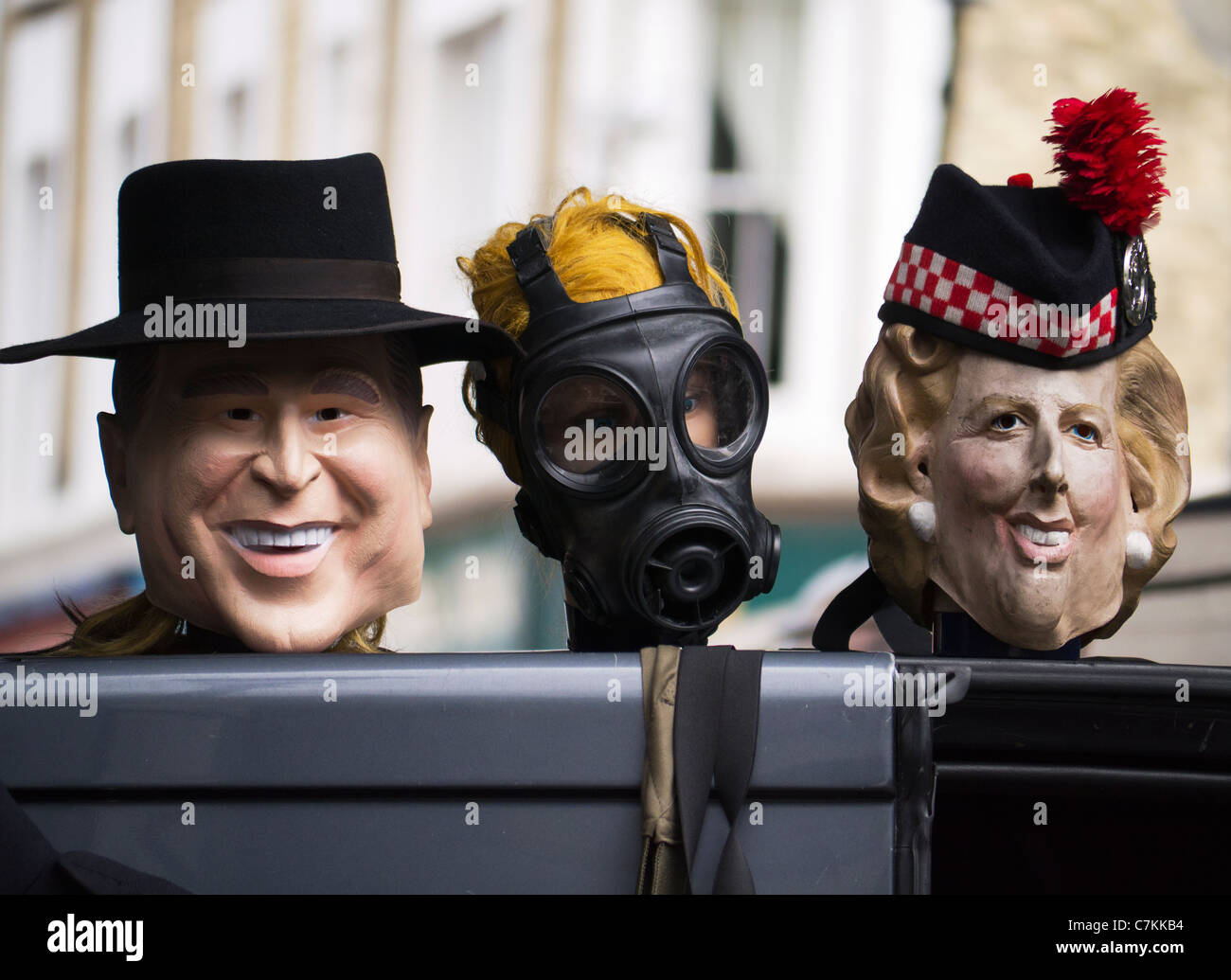 Portobello Road Market, London famous faces at stall selling masks and hats 4 Stock Photo Alamy