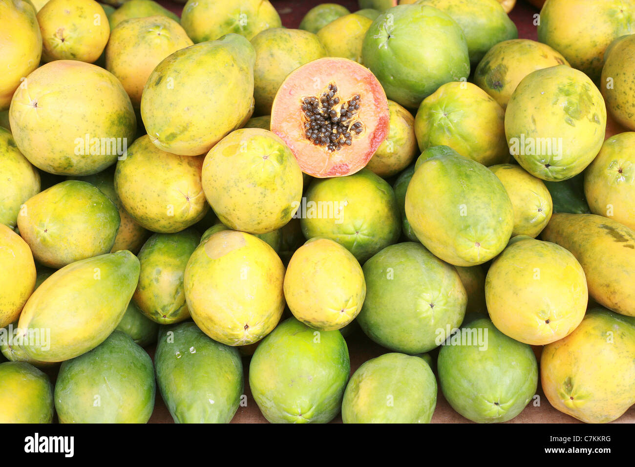 Papaya fruit cut and whole. Stock Photo