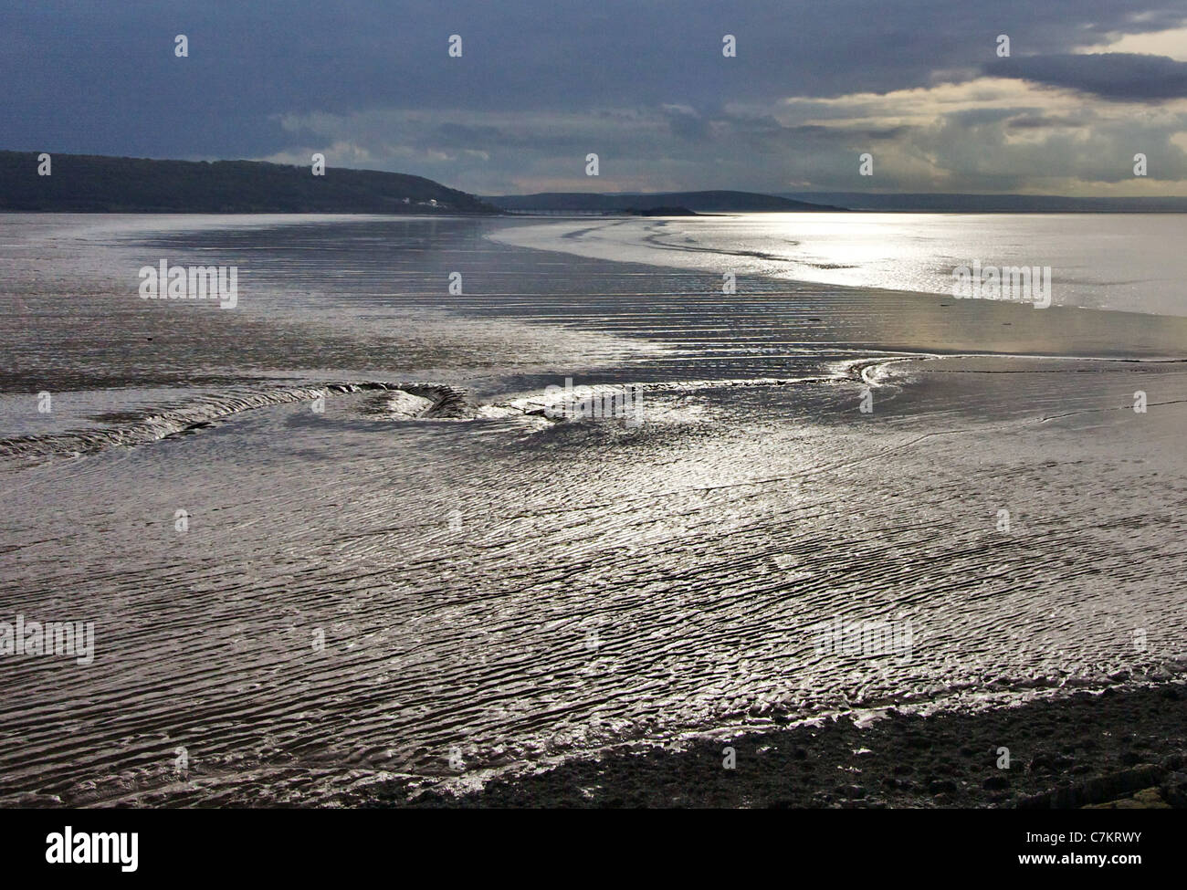 View from Sand Point over the tidal mud flats of Sand Bay to Weston super Mare in Somerset UK Stock Photo