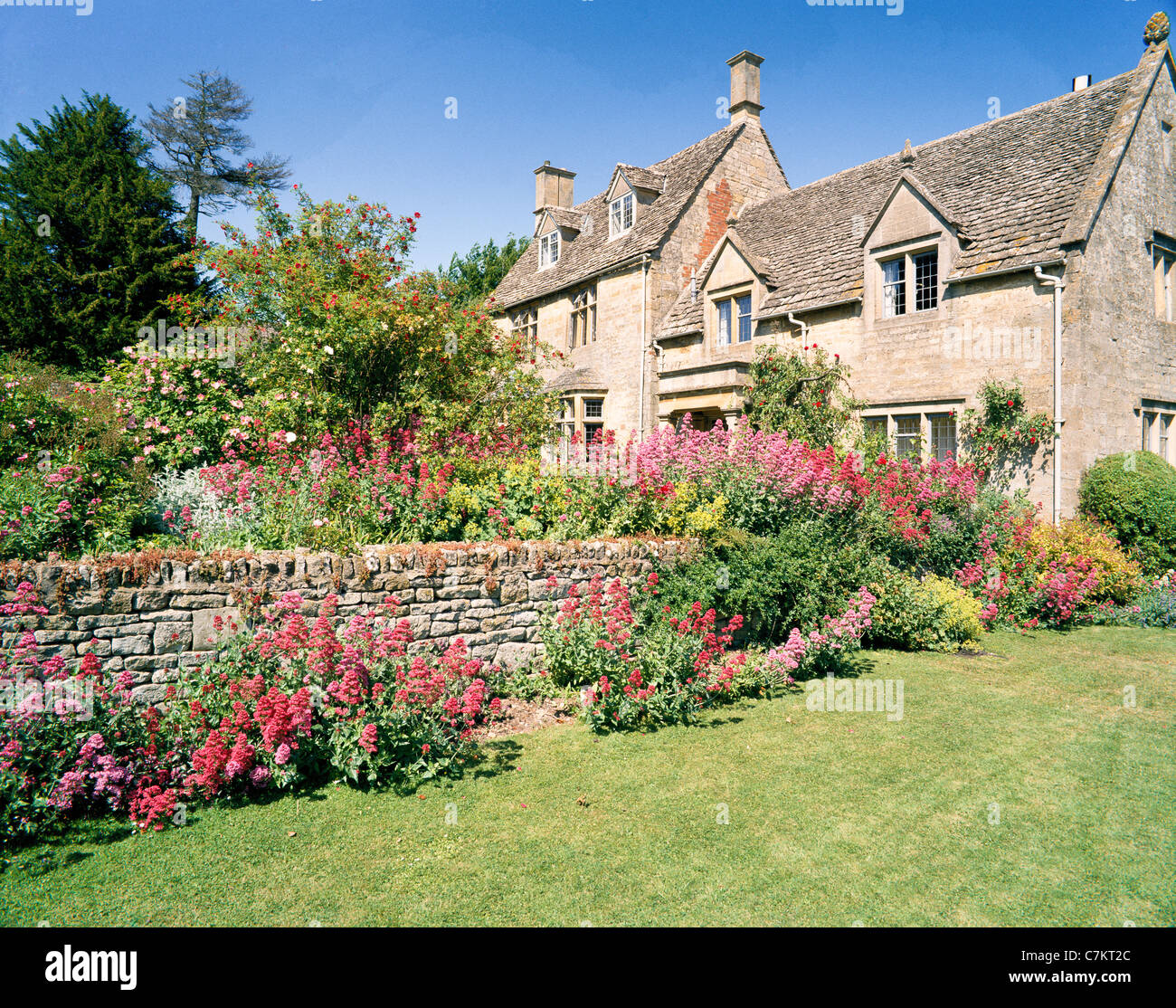 A summer garden in the Cotswold town of Chipping Campden, Gloucestershire Stock Photo