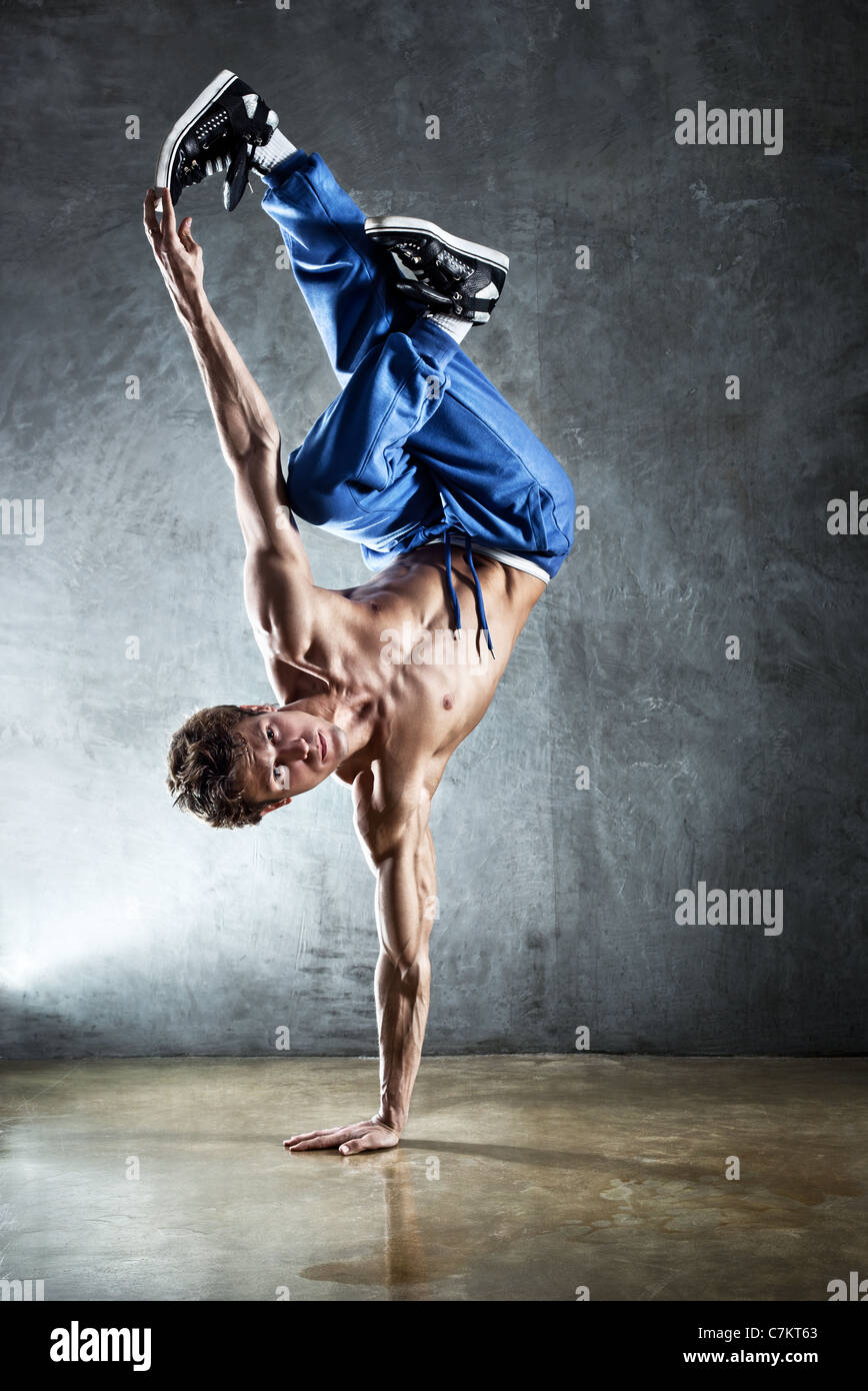 Young strong man break dance. Stock Photo