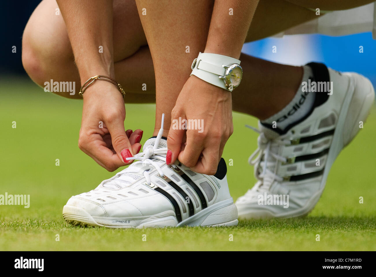 Tying Tennis Shoes High Resolution 