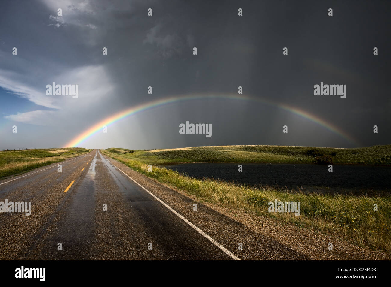 Prairie Road Storm Clouds Saskatchewan Canada field Stock Photo - Alamy