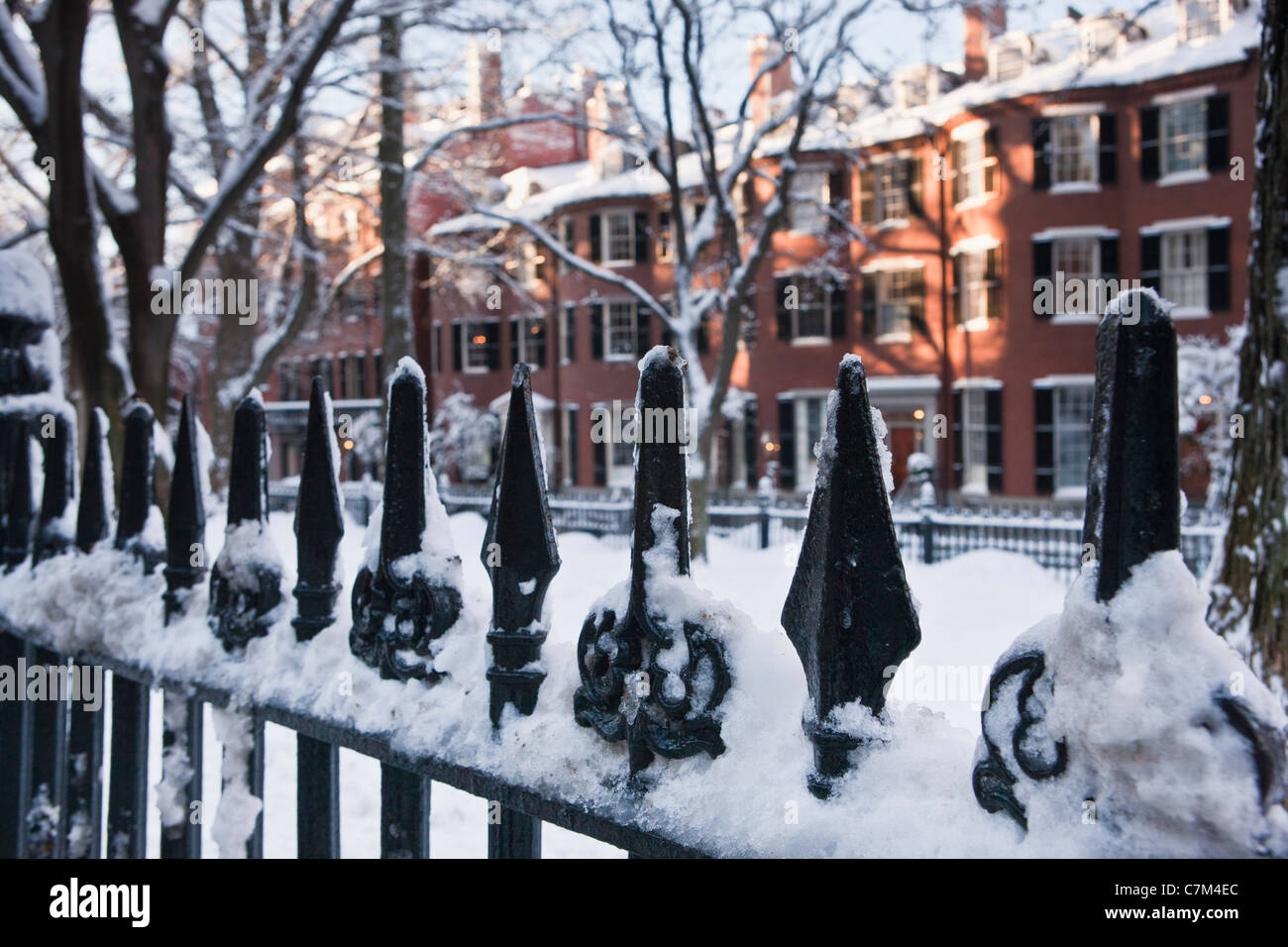 Wrought iron fence at Louisburg Square after winter storm on Beacon Hill, Boston, Massachusetts, USA Stock Photo