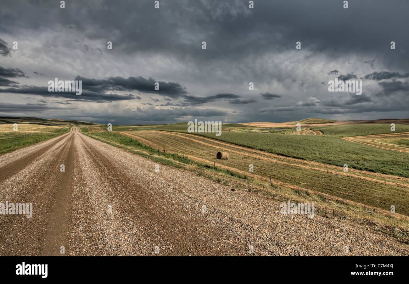 Prairie Road Storm Clouds Saskatchewan Canada field Stock Photo - Alamy