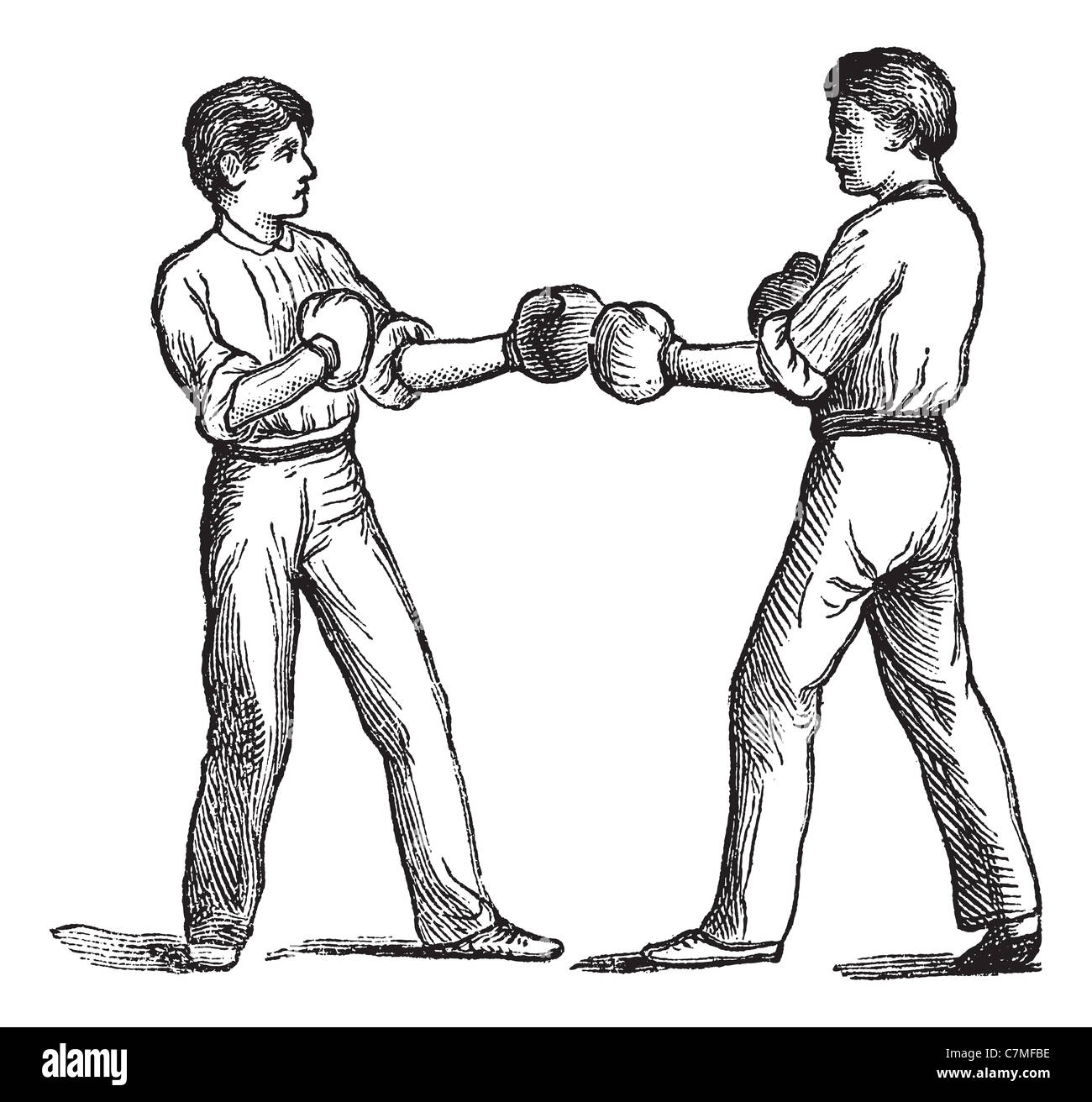 Two boxers in a fighting postion, vintage engraving. Old engraved illustration of two boxers in