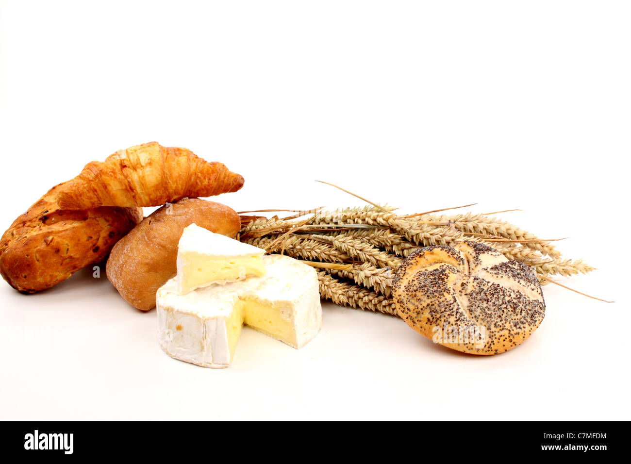 Fresh baked bread and wheat in a studio setting Stock Photo Alamy