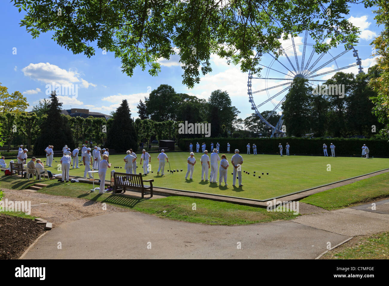Windsor & Eton Bowling Club, Windsor, Berkshire, UK.  A game of bowls on a sunny spring afternoon. Stock Photo
