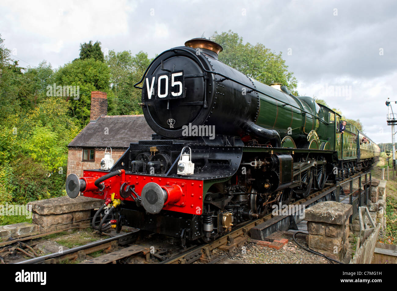 GWR King Class 4-6-0 No 6024 King Edward I steam locomotive approaches Hampton Loade Station on the Severn Valley Railway Stock Photo