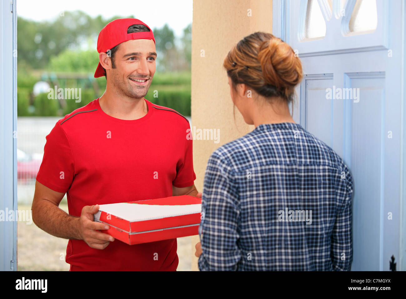 Man delivering pizza Stock Photo Alamy