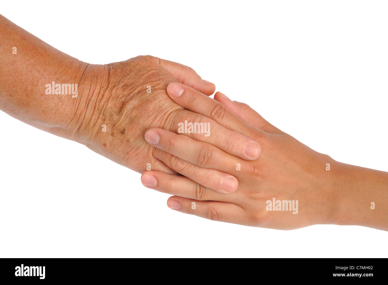 Hands of young and senior women - helping hand concept - clipping path included Stock Photo