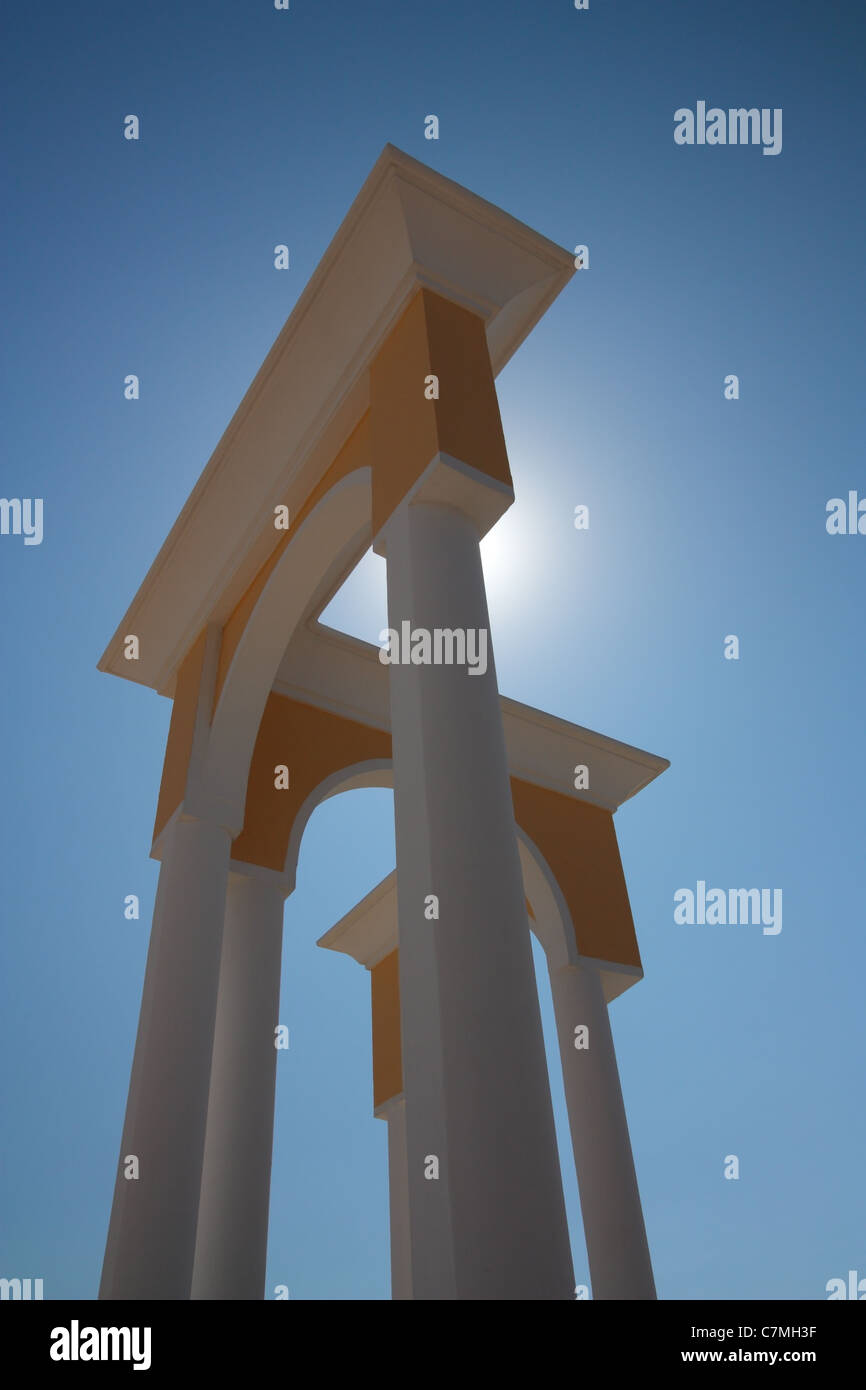 Architecture. Arch, columns against the sky in front of the sun Stock Photo