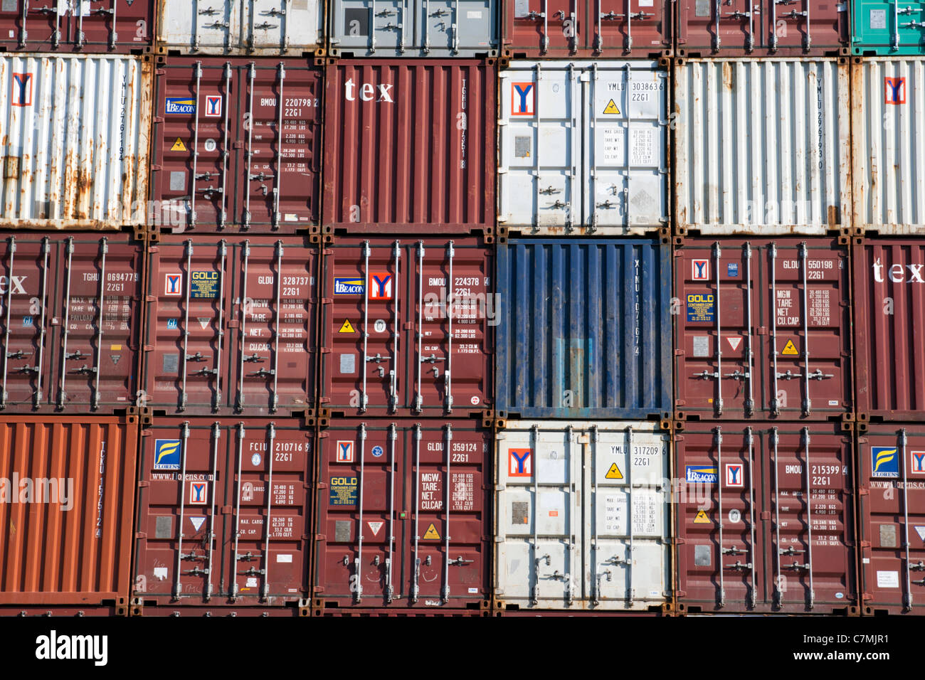 Stack of freight containers at the docks Stock Photo