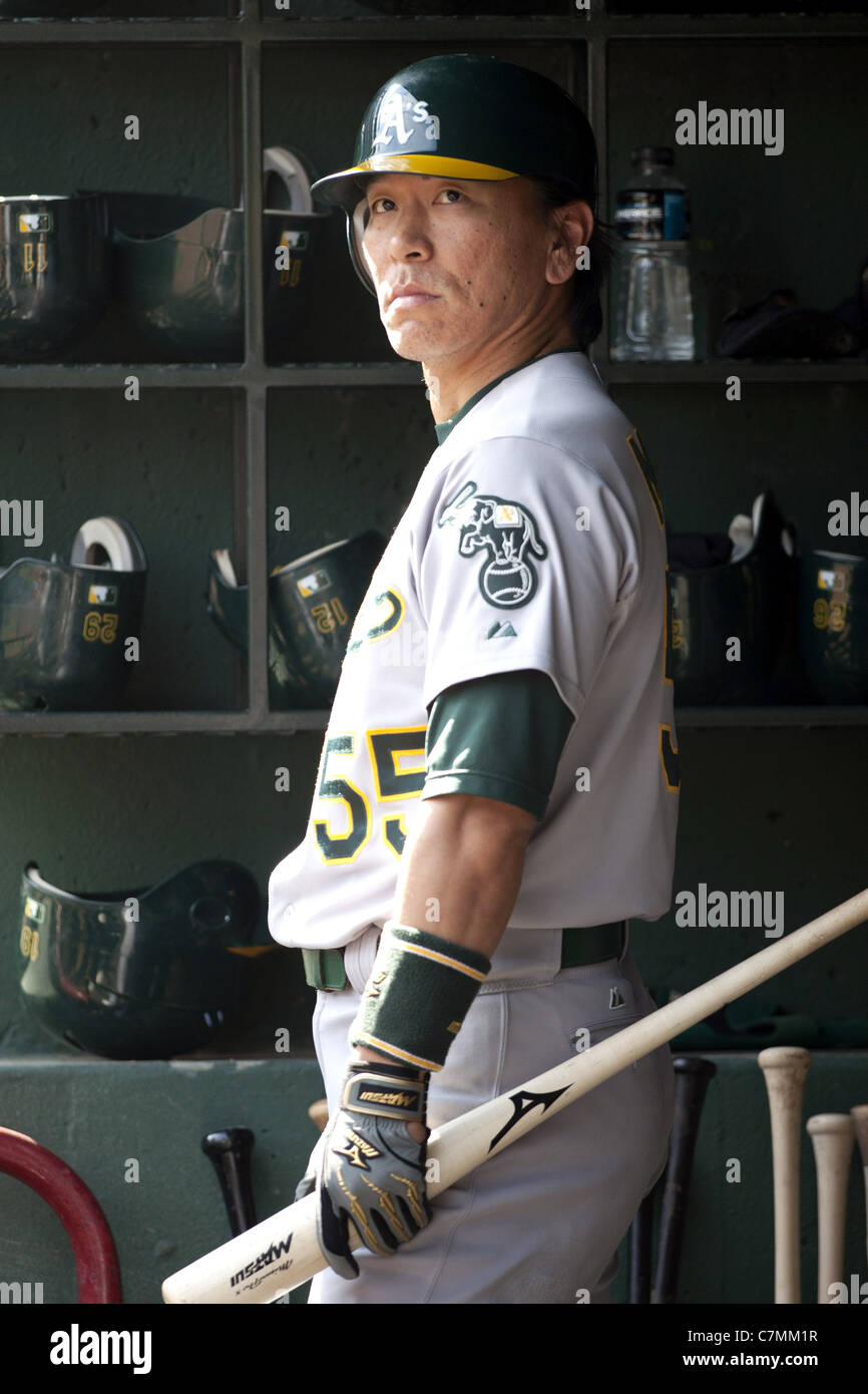 Hideki Matsui (Athletics) waits for his turn during the game against the Texas Rangers. Stock Photo
