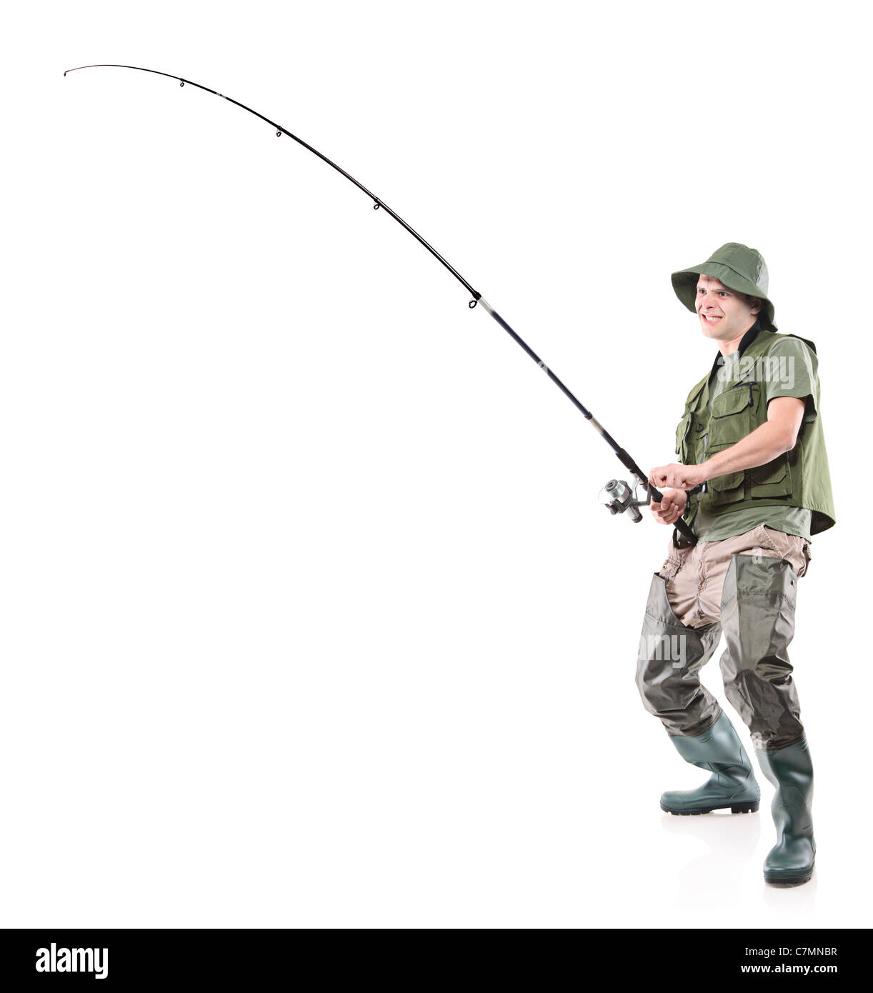 Full length portrait of a fisherman holding a fishing pole Stock